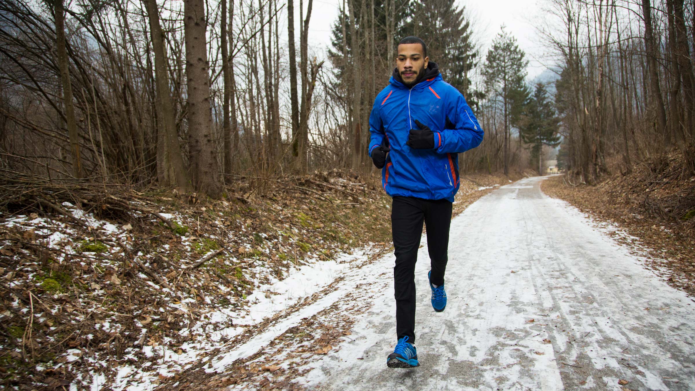 Man running outside in the snow