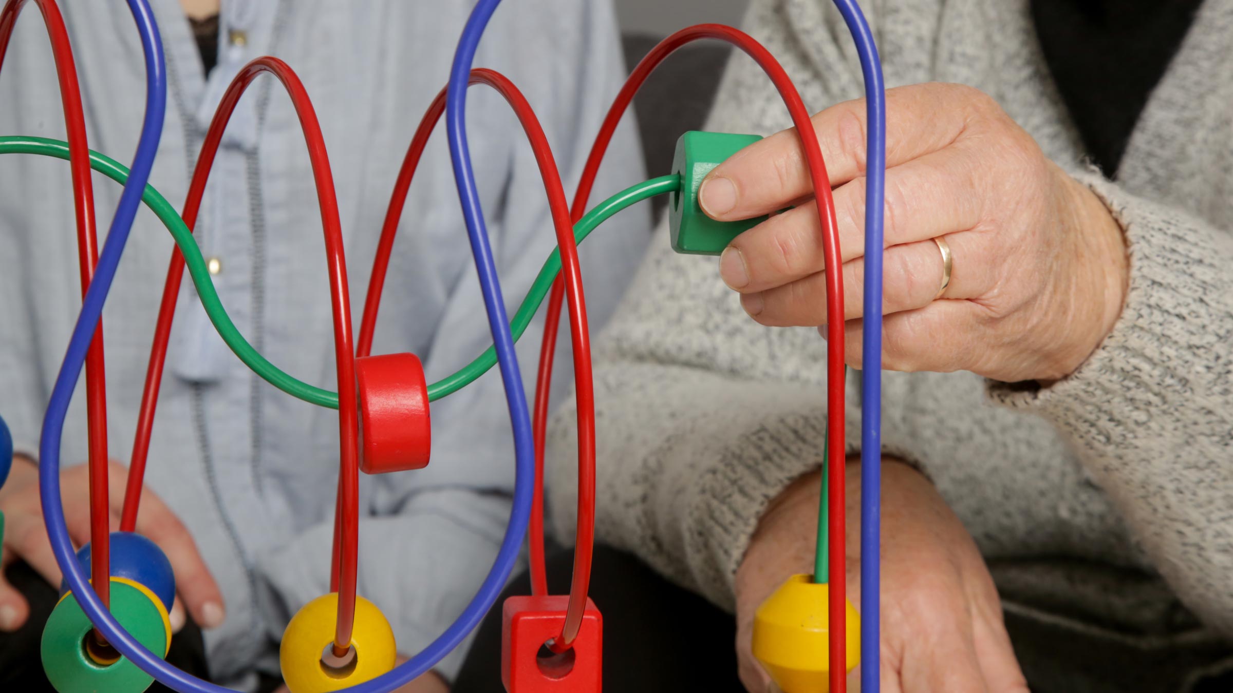 Senior woman preventing or slowing Alzheimer’s disease with a memory game