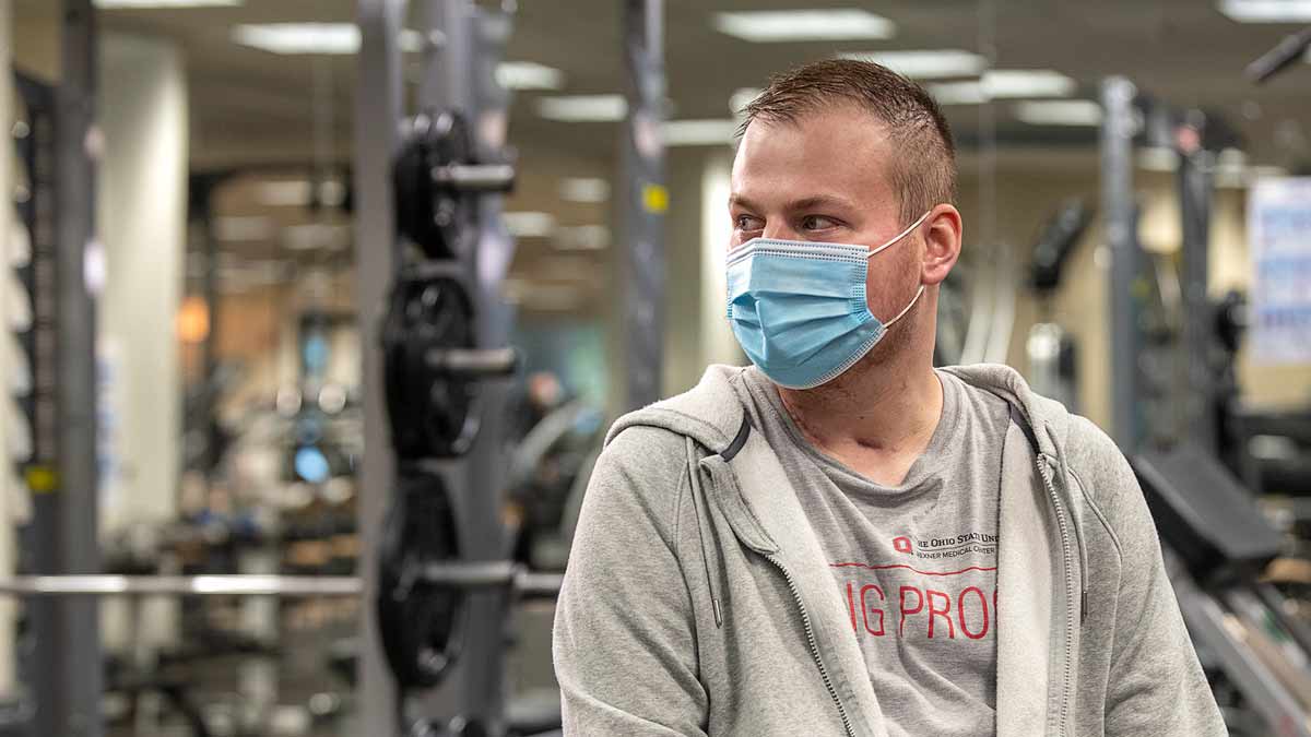 Kodi Elder, recovering COVID-19 patient and lung transplant recipient sitting in a rehab facility