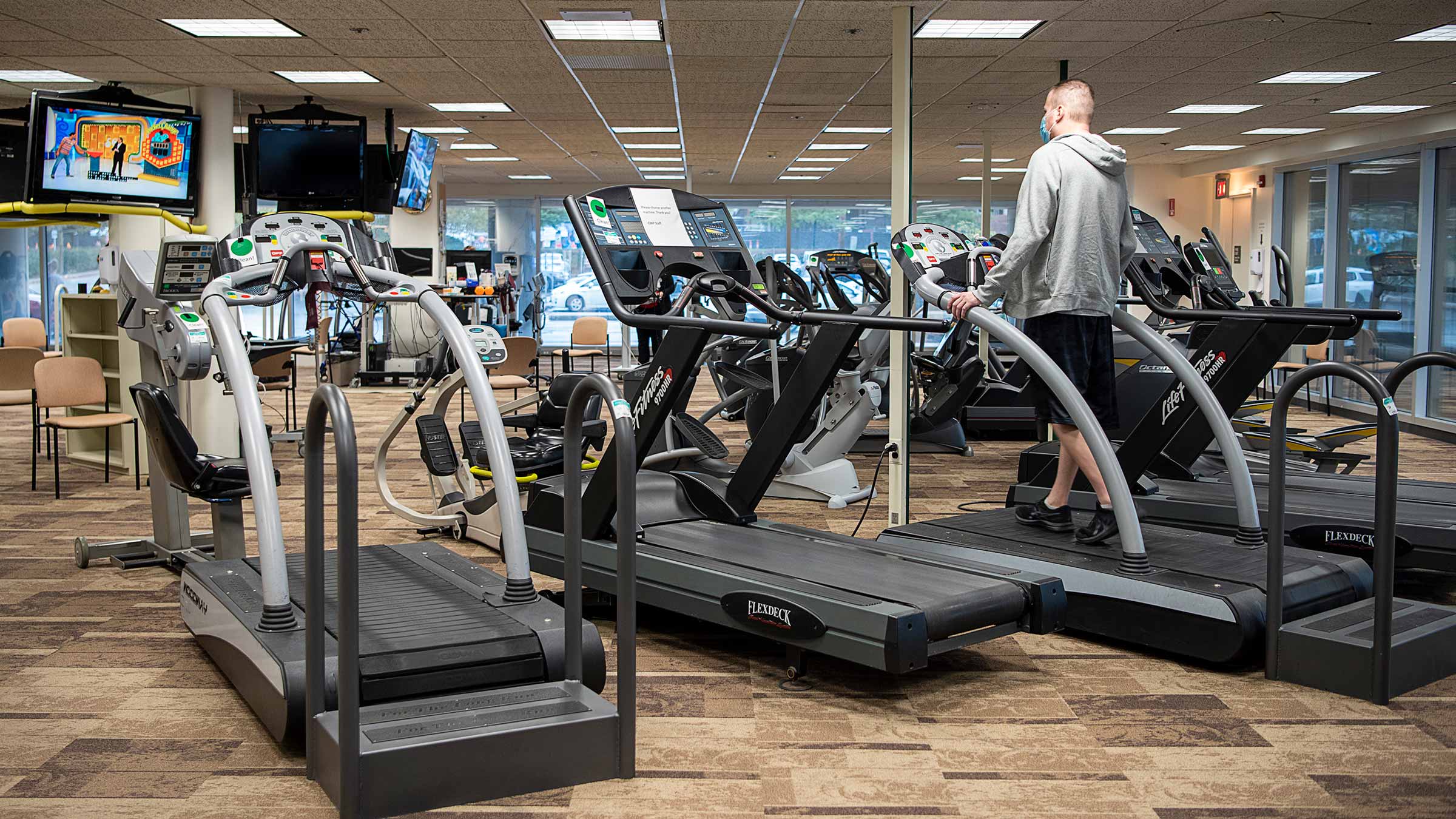 Kodi walking on a treadmill in a pulmonary rehabilitation facility