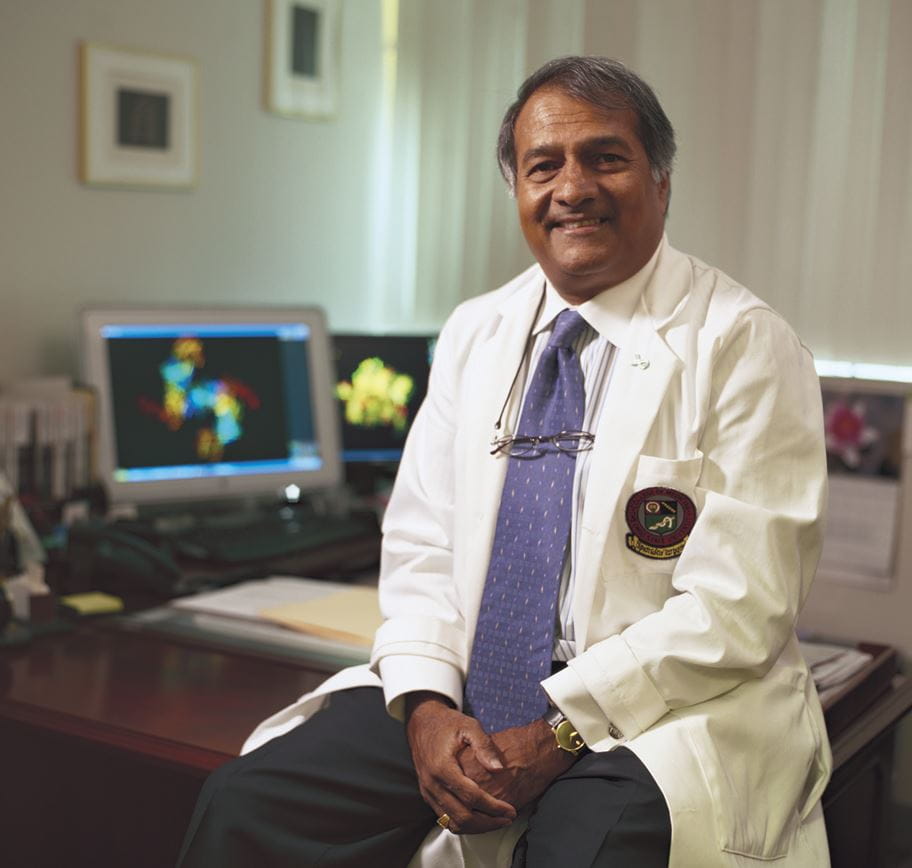 Pravin Kaumaya, PhD in his office
