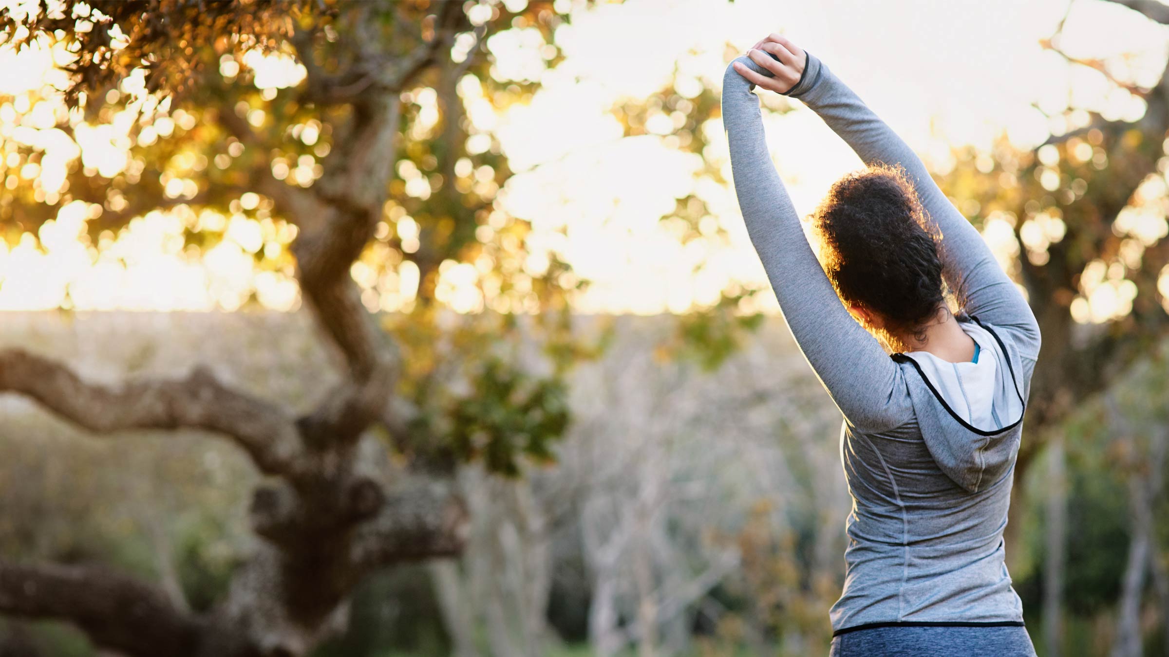 Woman stretching outside before a run