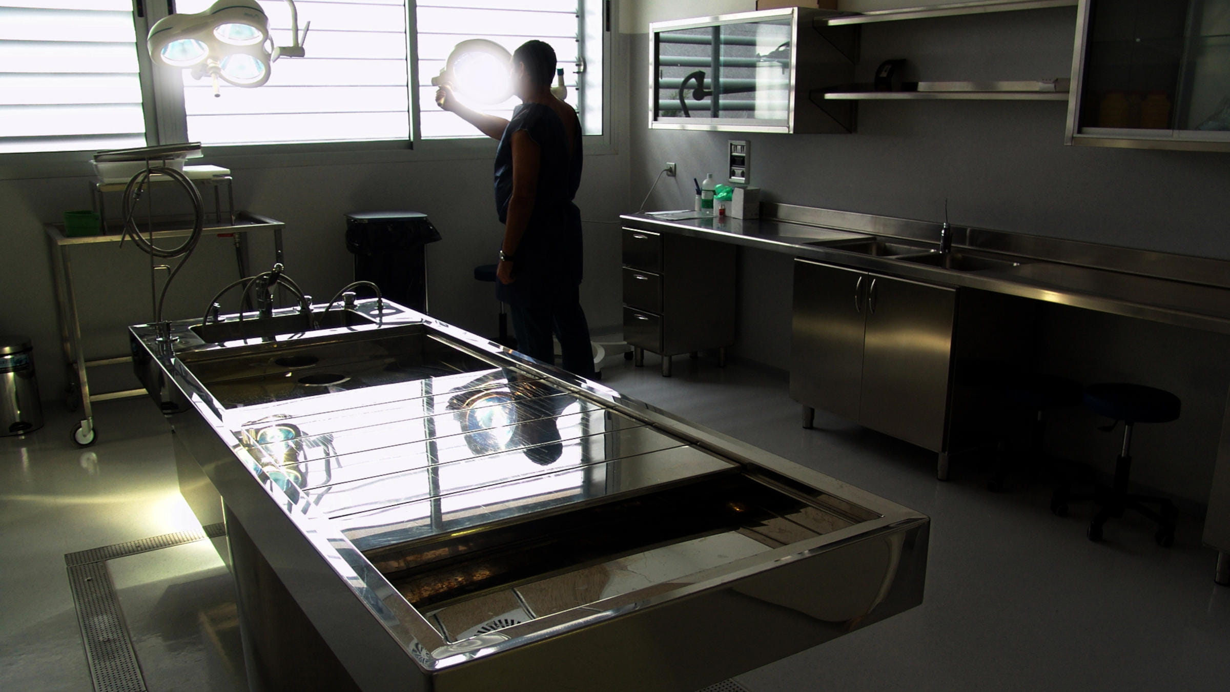 Man in autopsy room