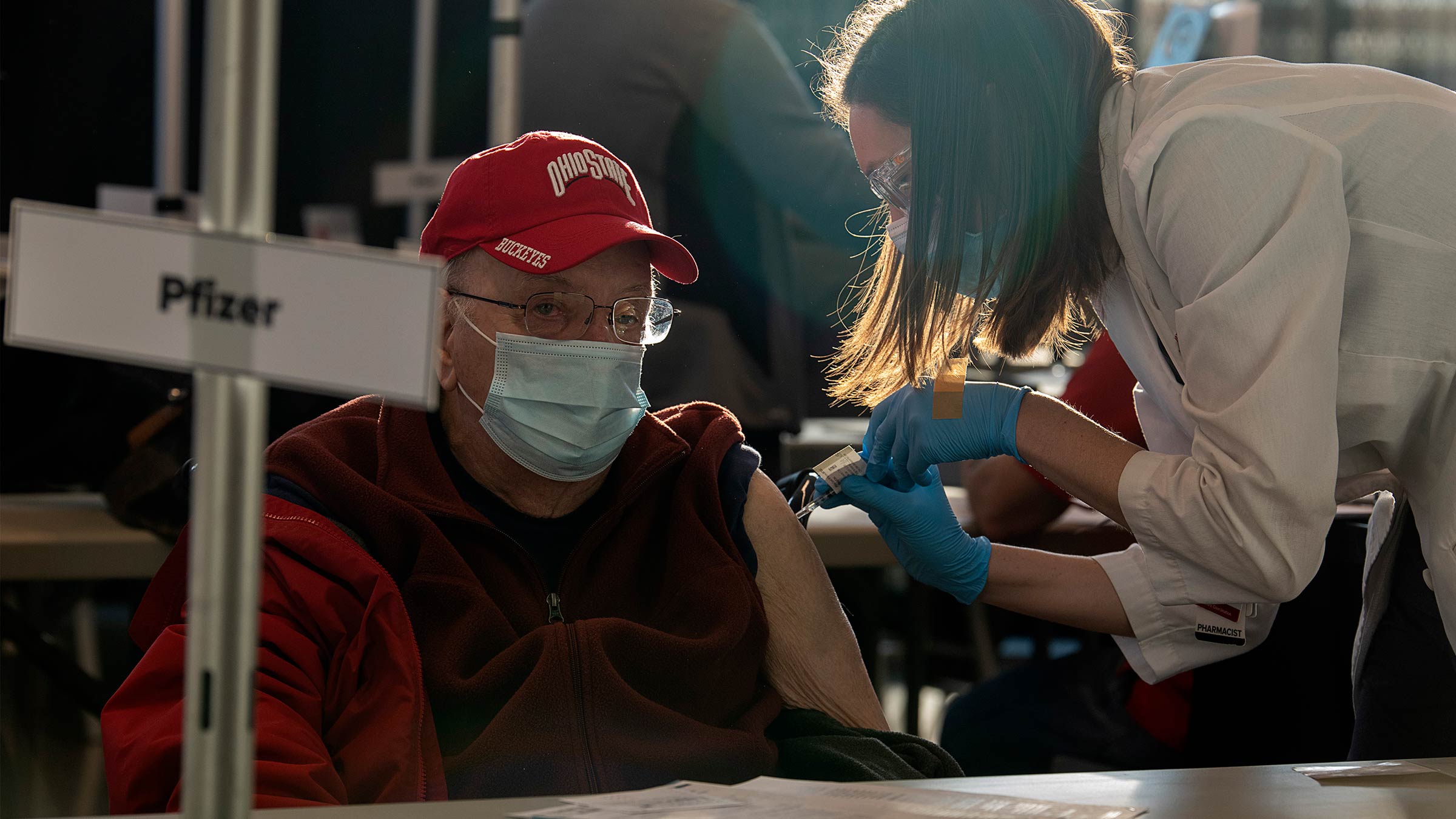 Elderly man getting a COVID-19 vaccine