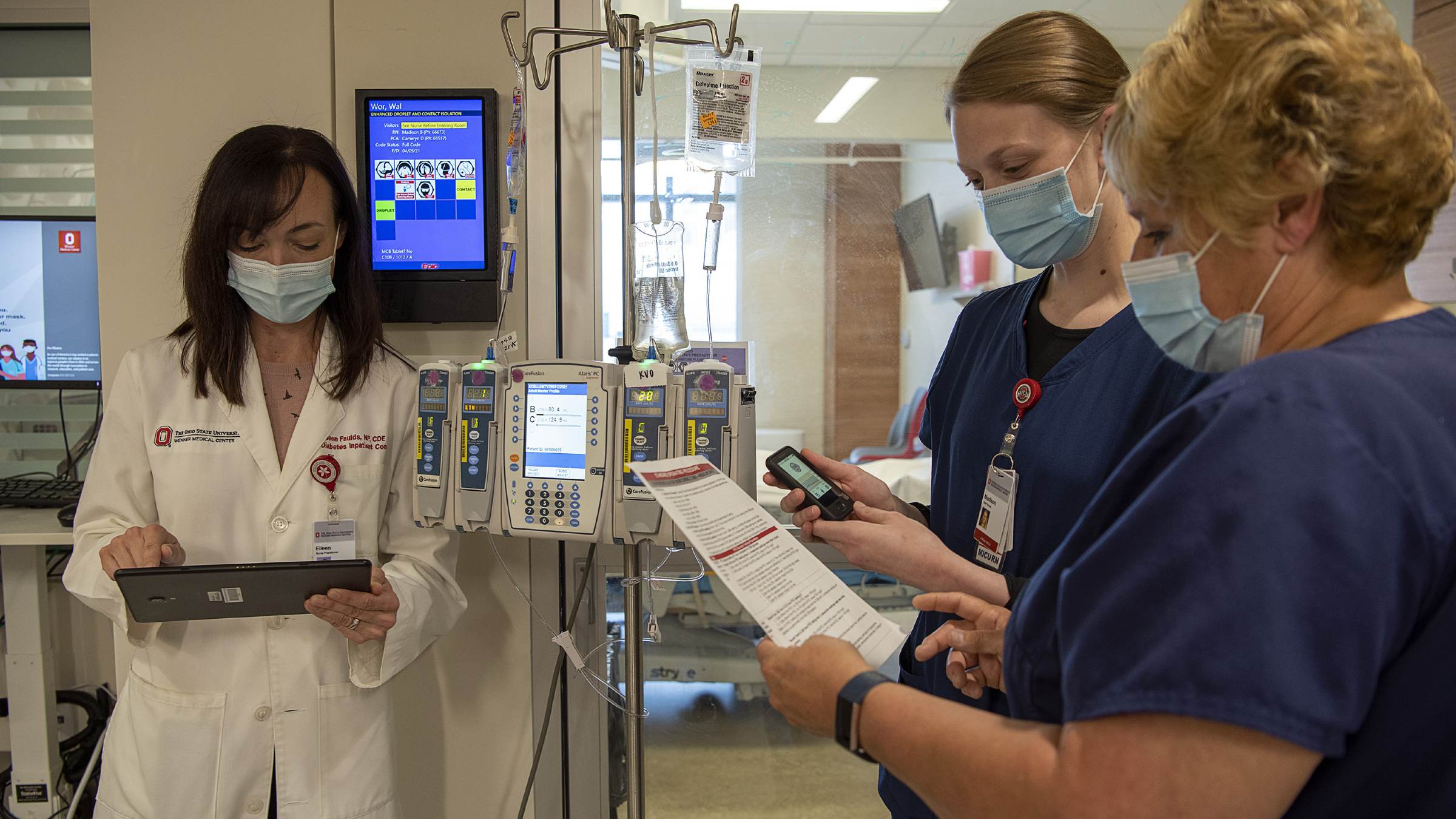 Ohio State nurses discussing new glucose monitoring system