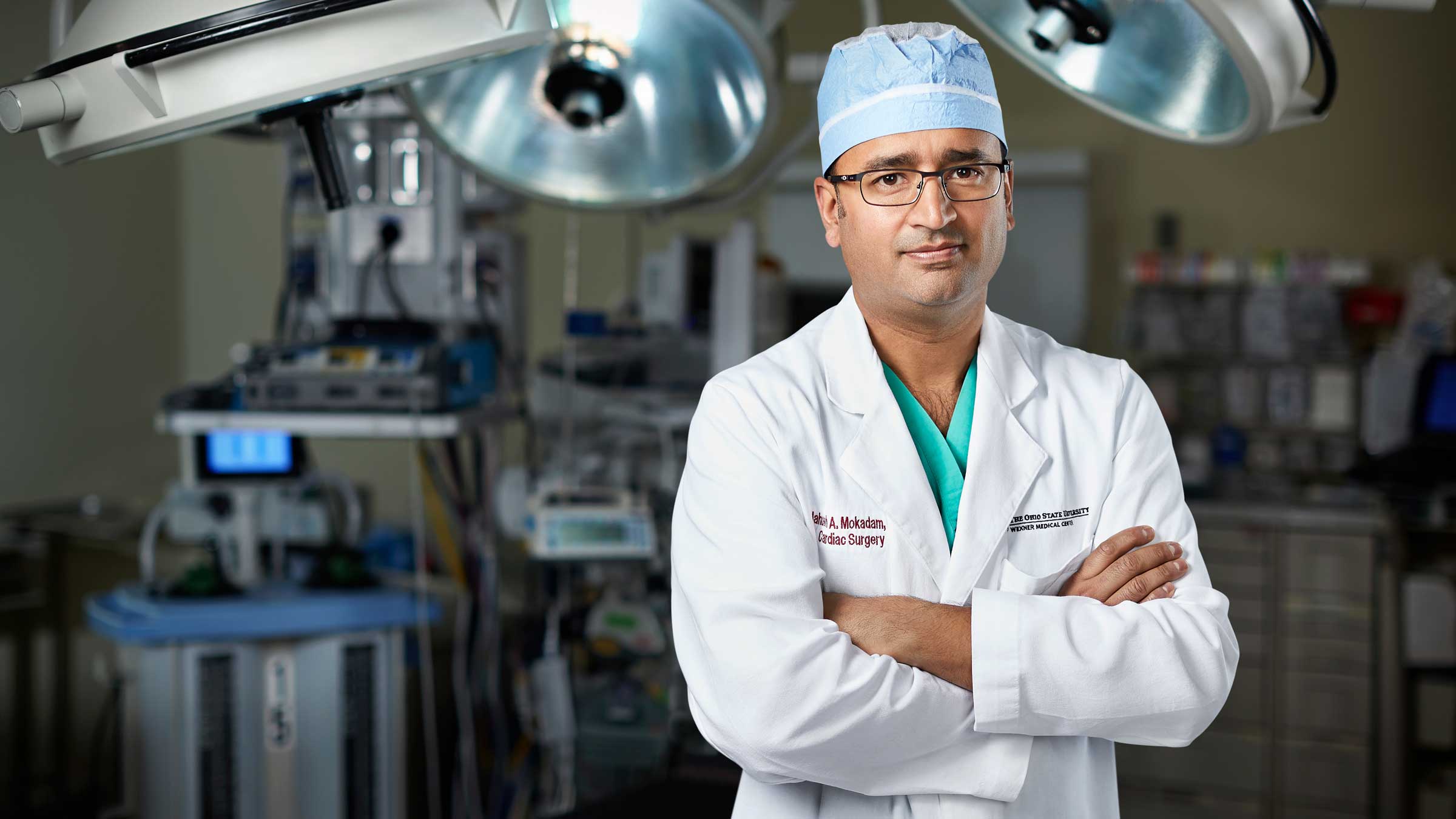 Cardiac surgeon Nahush Mokadam, MD, standing in the surgical suite