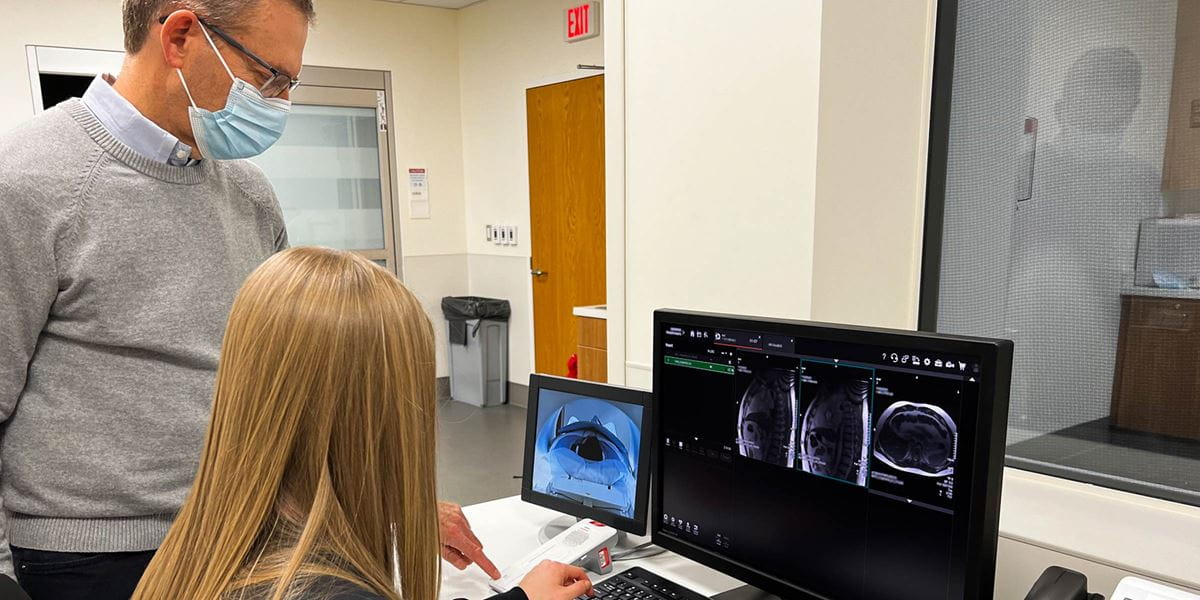 Orlando Simonetti, PhD supervising an MRI scan