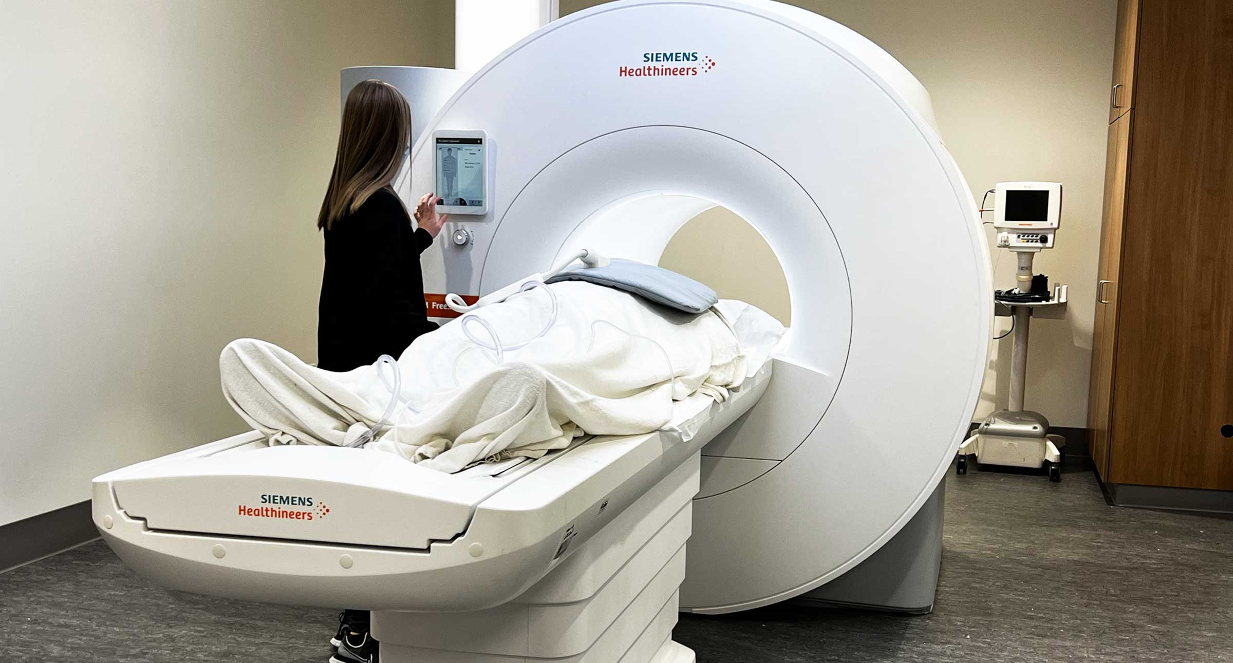 A patient going into an MRI machine