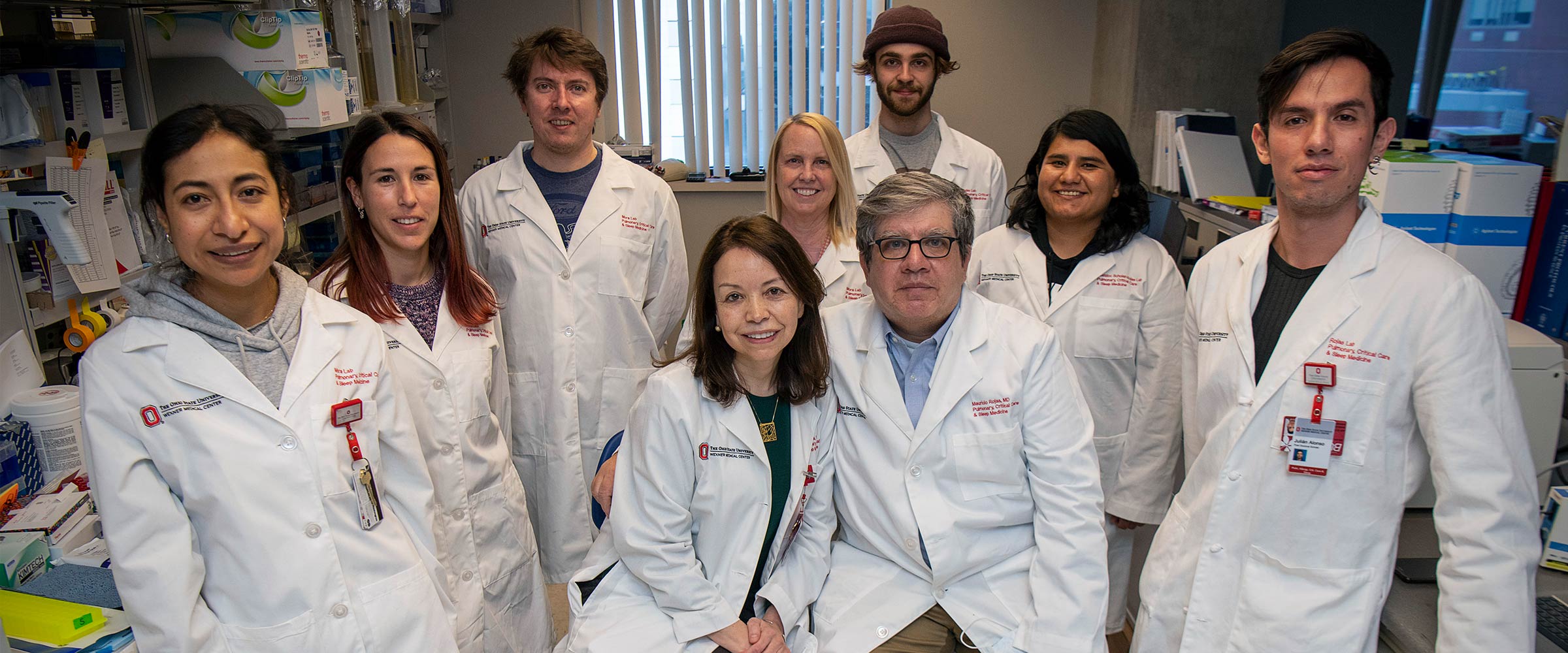 Mauricio Rojas, MD, and Ana Mora, MD, with their team in their lab at Ohio State
