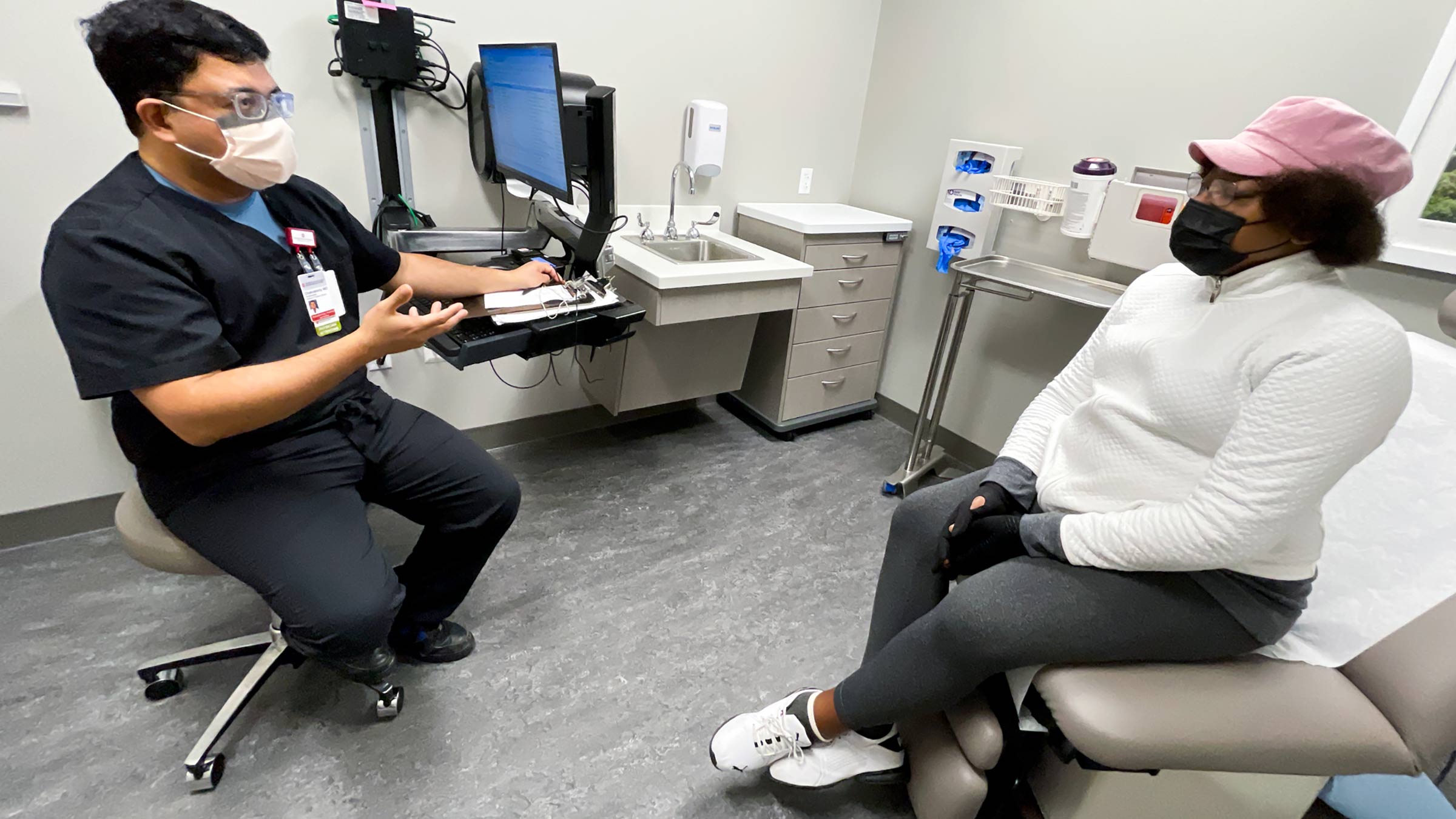 Doctor and patient are talking at a gastroenterology appointment