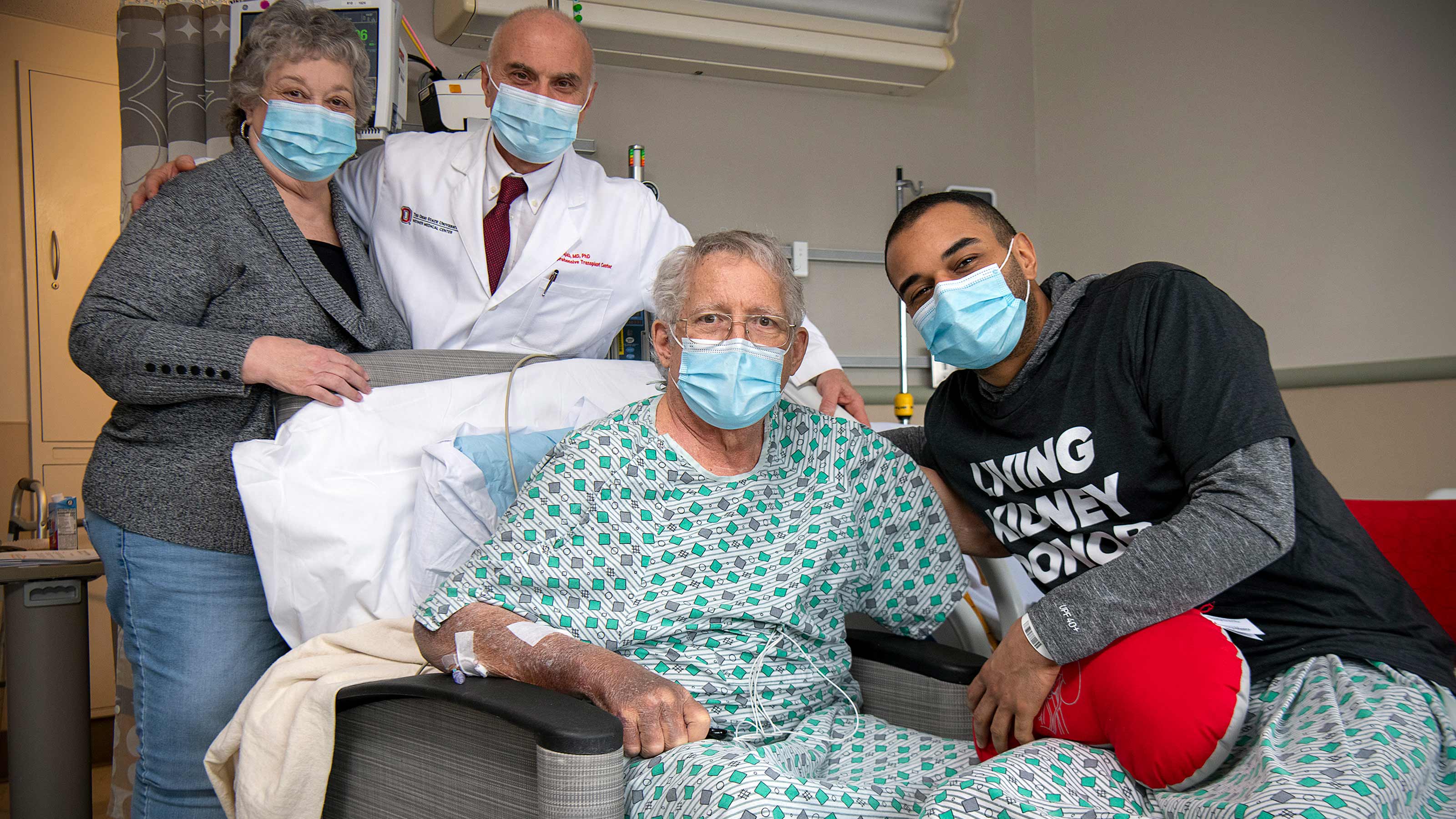 Gail and Josh sitting with Jonathan in the hospital after his kidney transplant at Ohio State