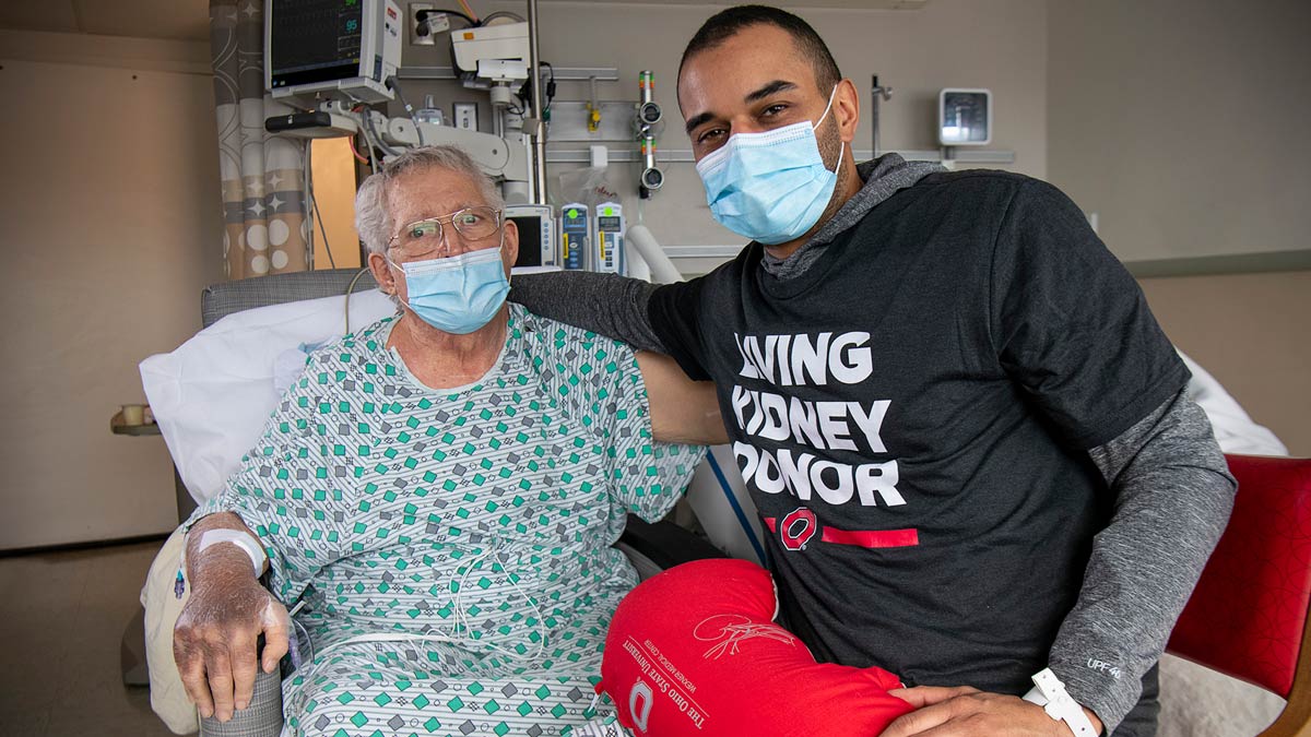 Jonathan and Josh sitting together in a hospital room at Ohio State Medical Center