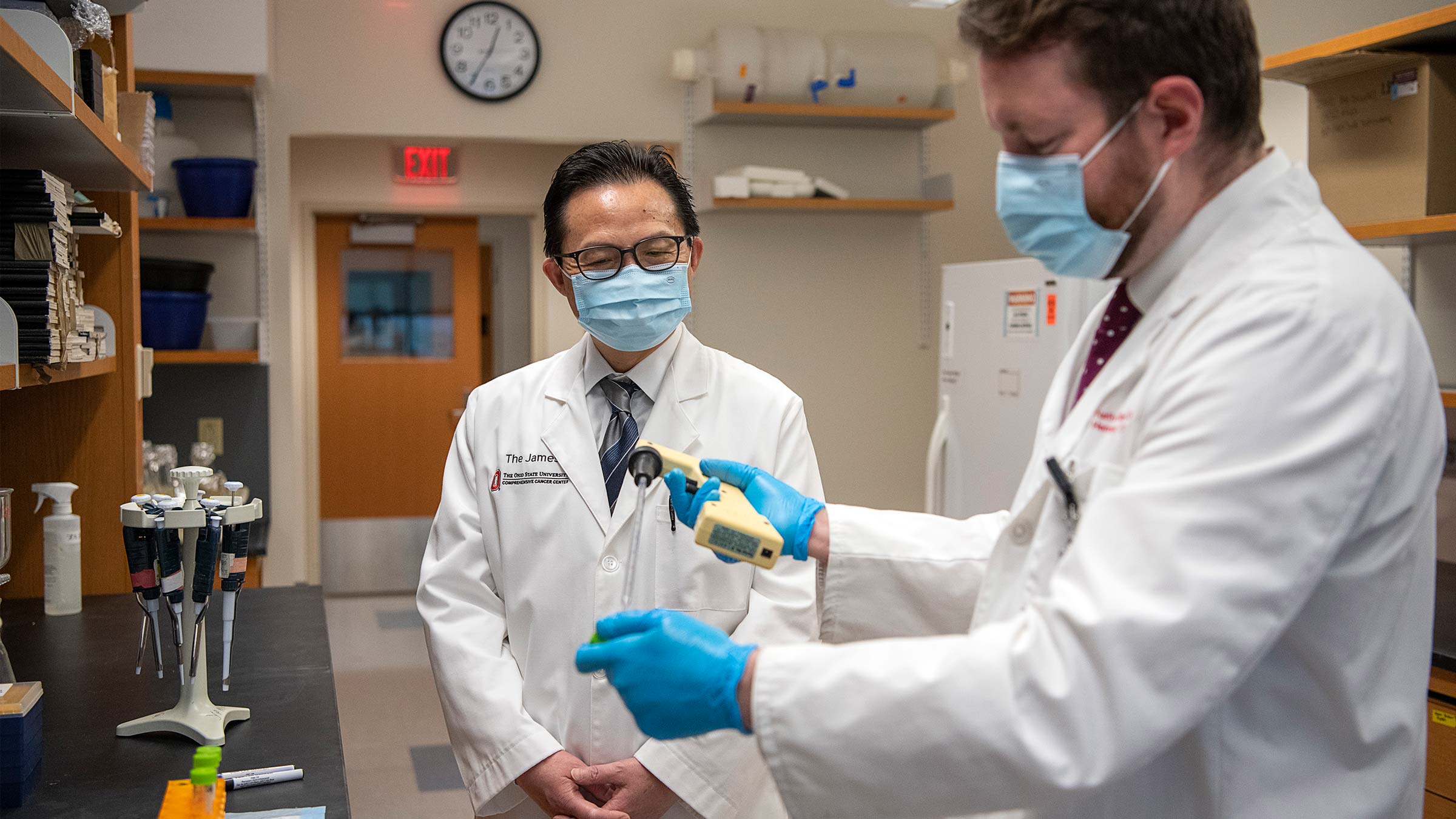 Yiping Yang, MD, PhD, working with a researcher in his lab at Ohio State