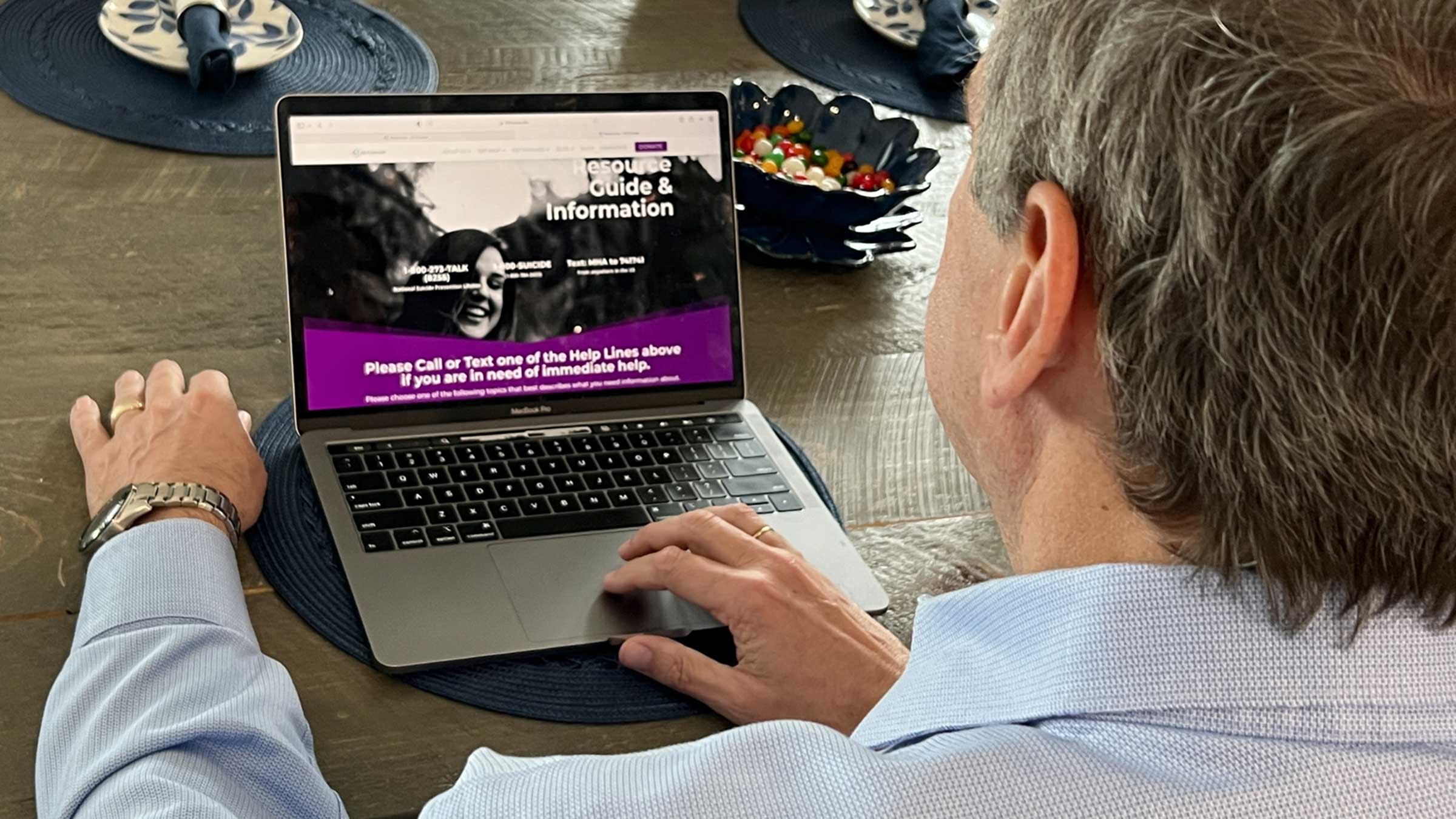 Suicide prevention website on a laptop