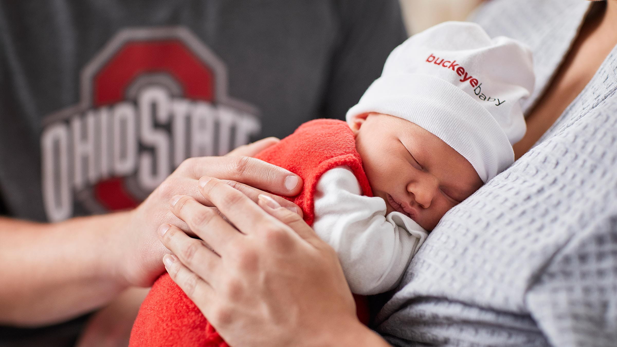 Newborn baby on a his mother's chest