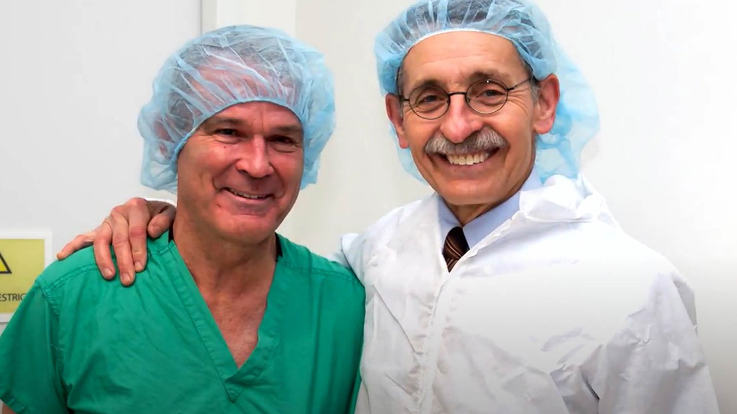 Dr. Farrar and Dr. Schueller together in scrubs