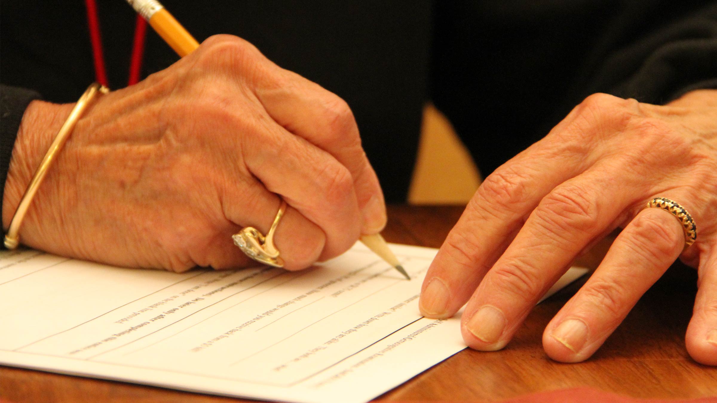 Elderly woman taking the SAGE test