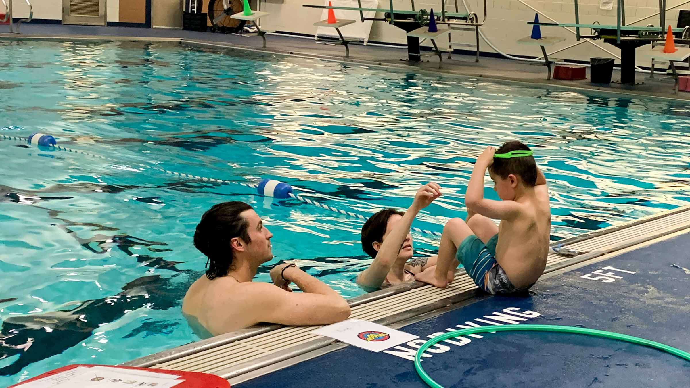 Family at a swimming class