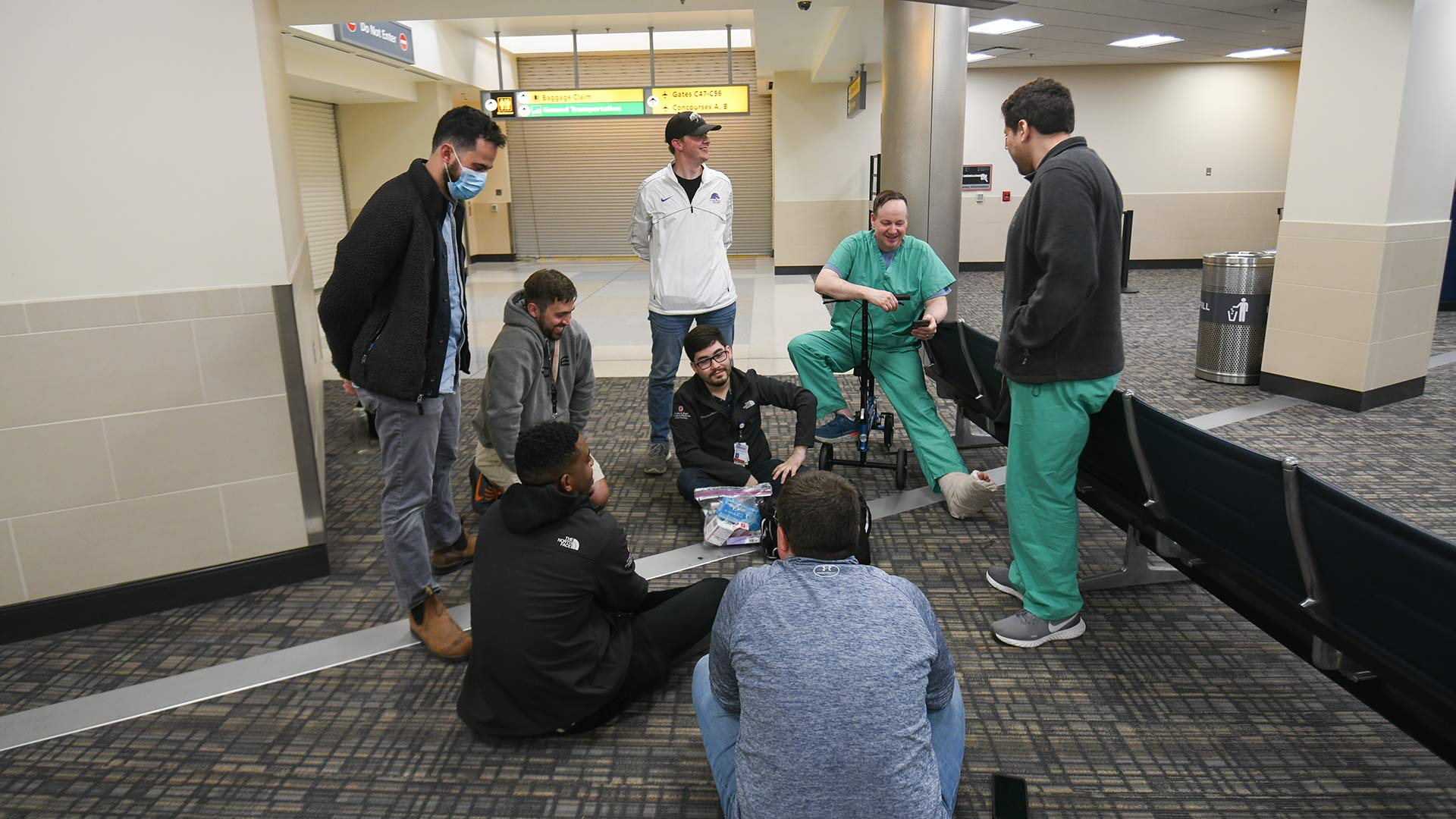 Students talking in the airport