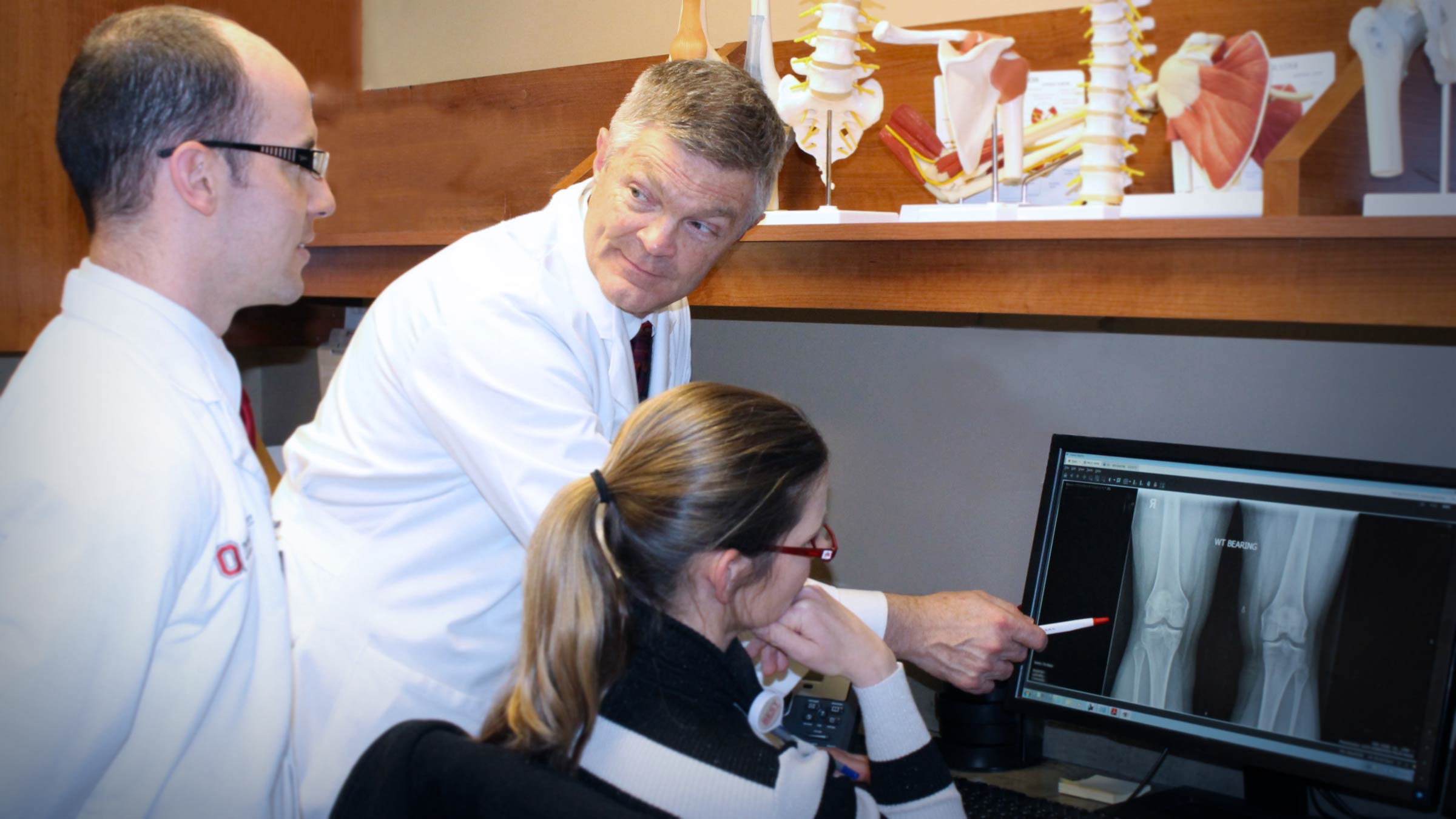 Christopher Kaeding, MD pointing to an xray of a knee