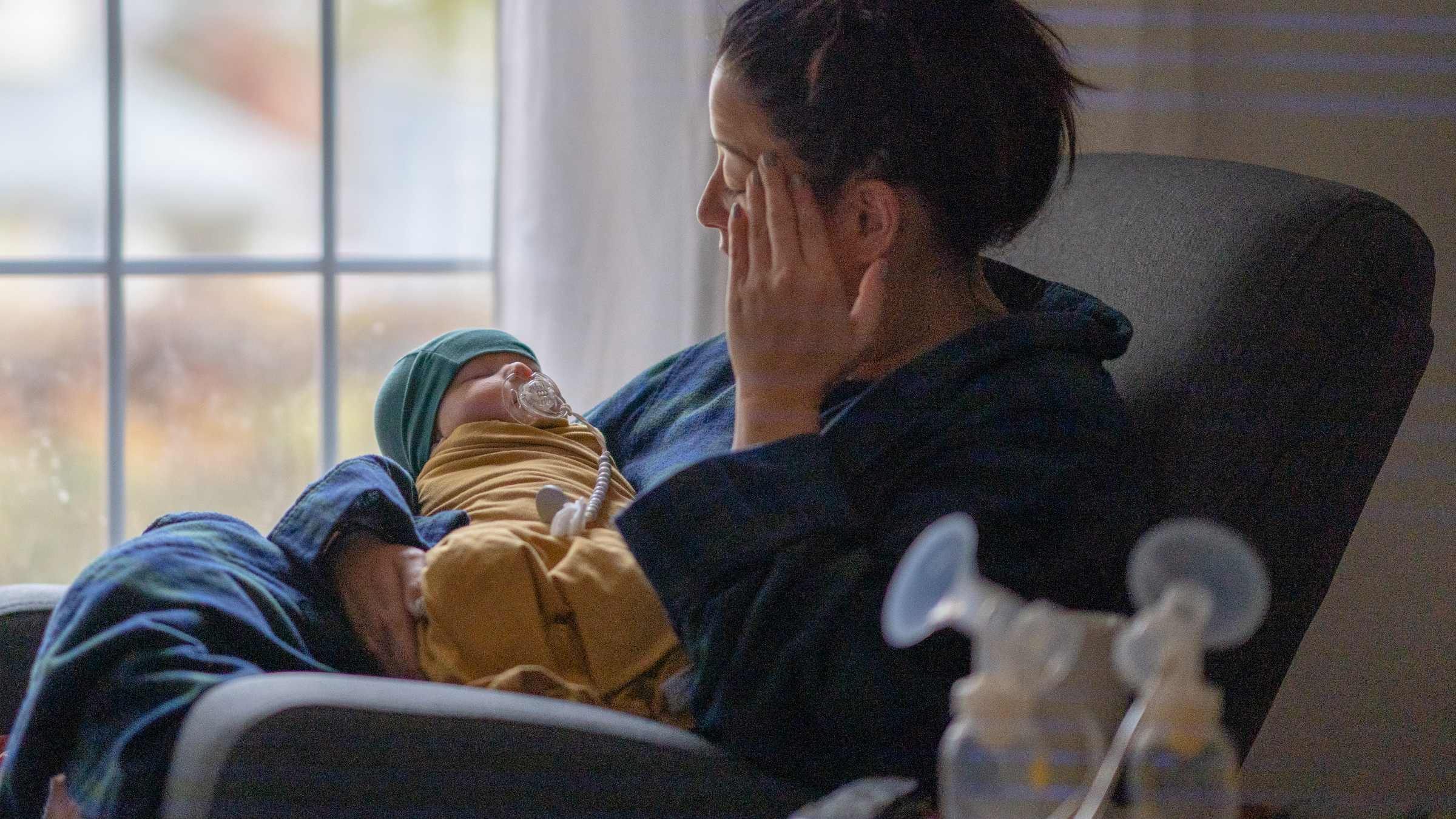 Mother holding her newborn baby