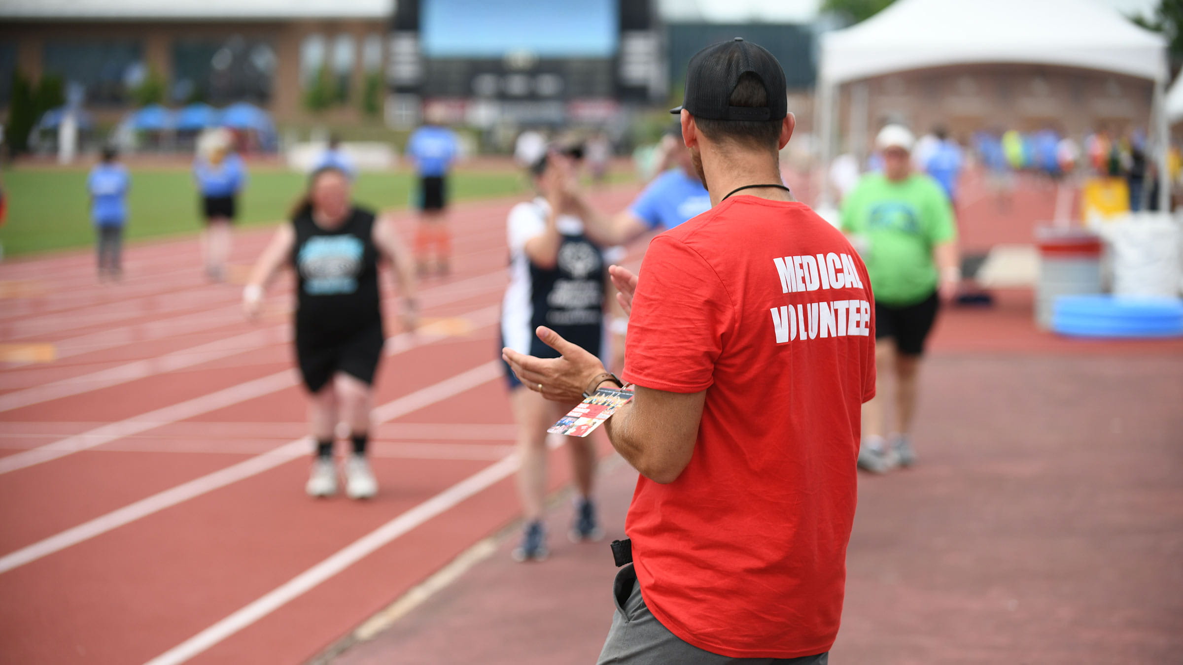 Michael Jonesco cheering for athletes