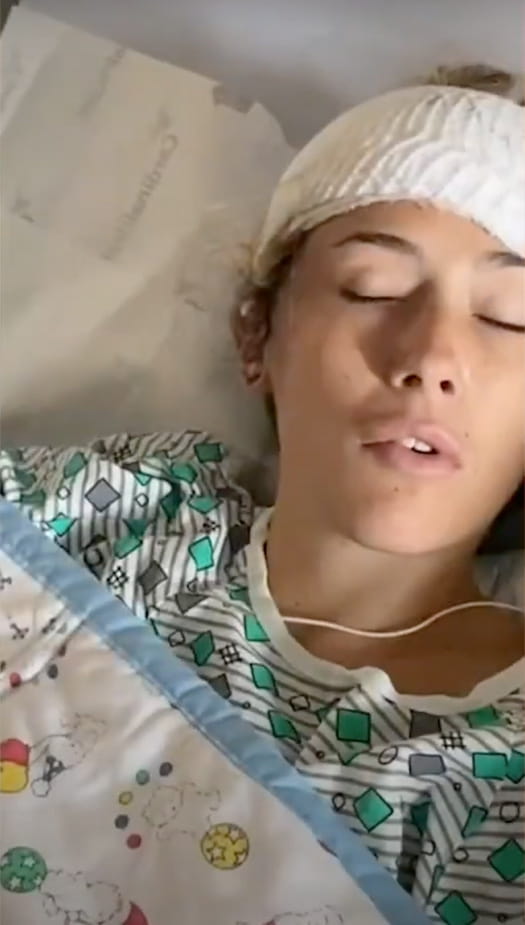 Borah in a hospital bed after surgery