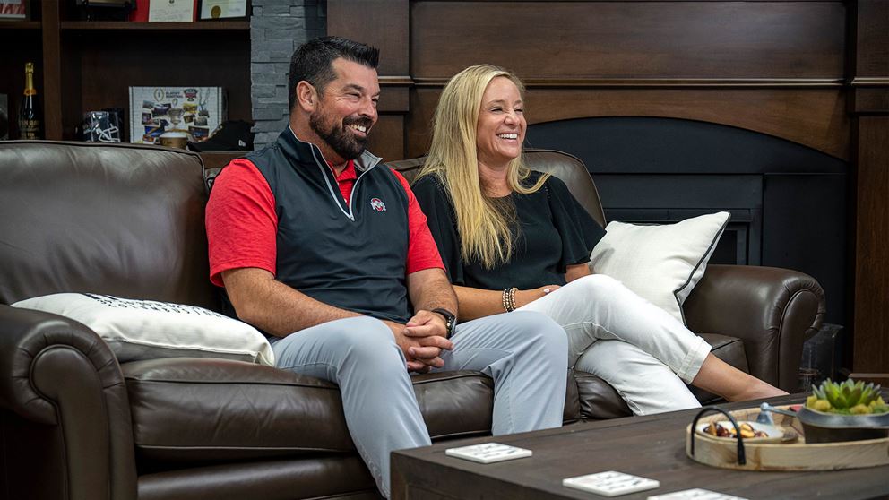 Coach Ryan Day and his wife Nina laughing
