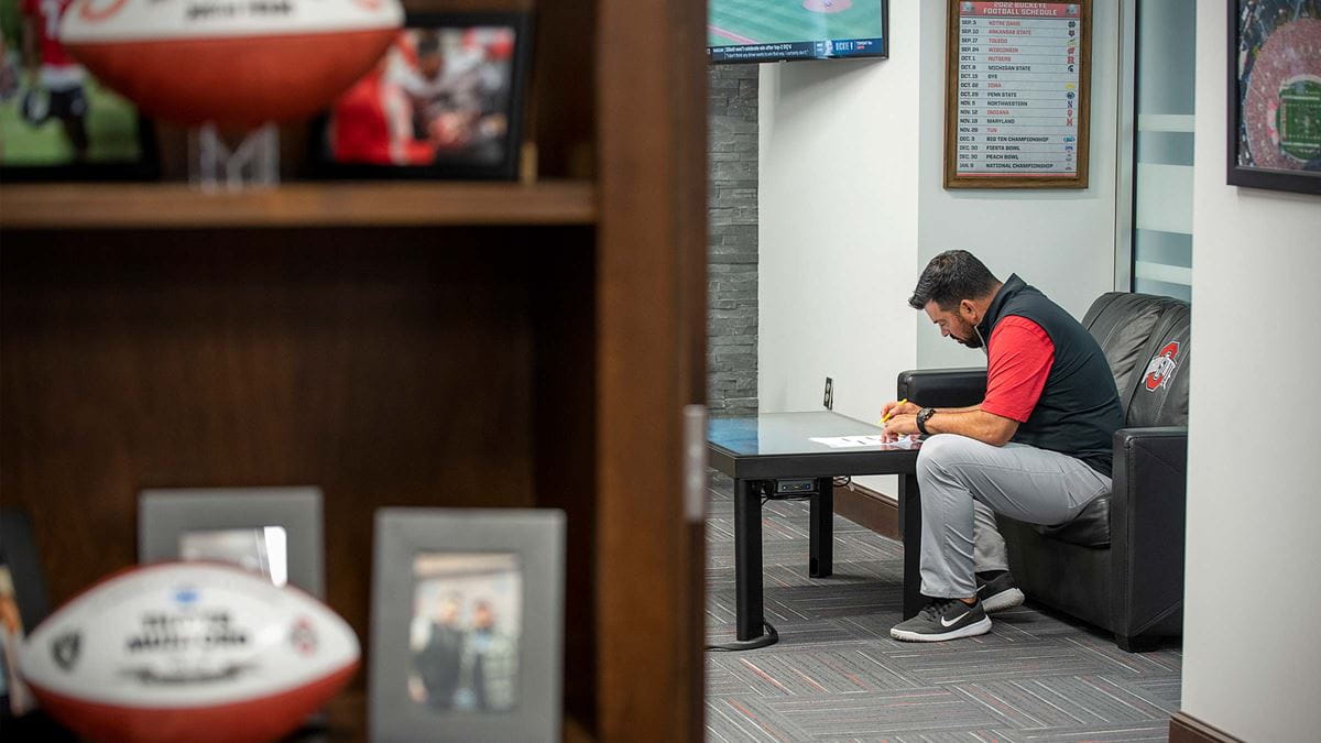 Coach Ryan Day writing