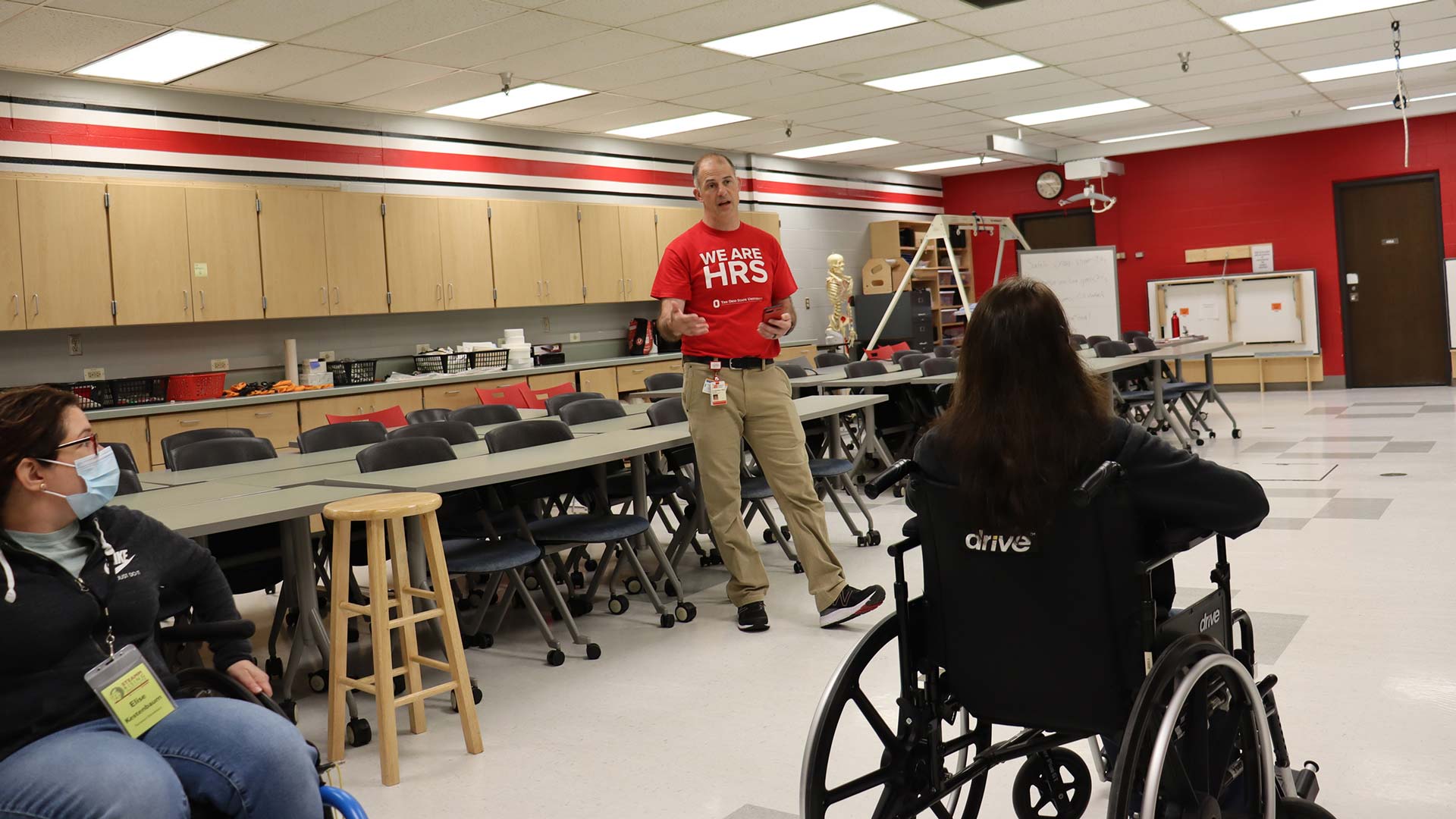 HRS teacher and a STEAMM Rising program participant in a wheelchair