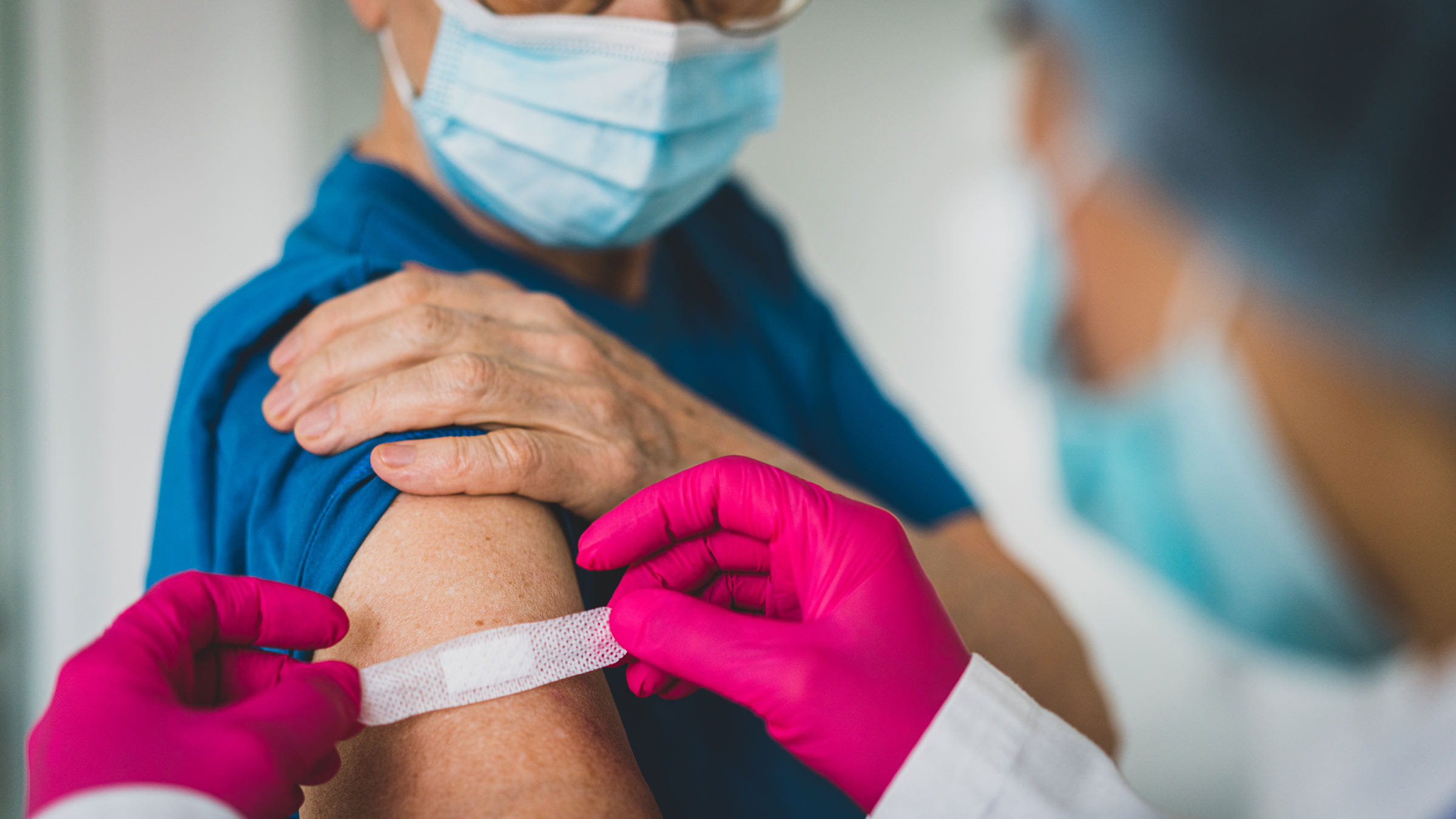 Health care worker receives the COVID-19 vaccine