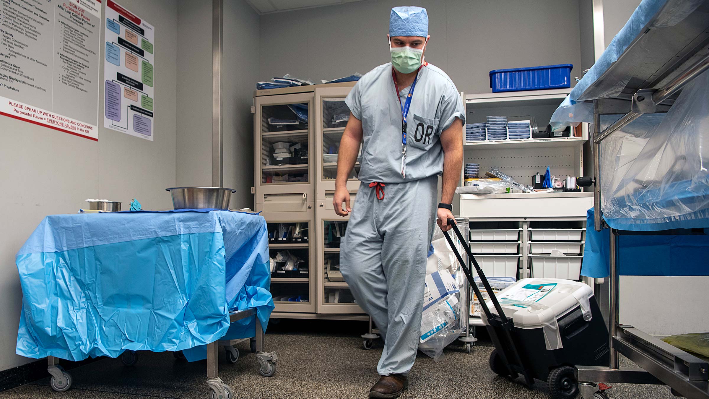 Ohio State operating room nurse with a cooler containing a liver ready for transplant