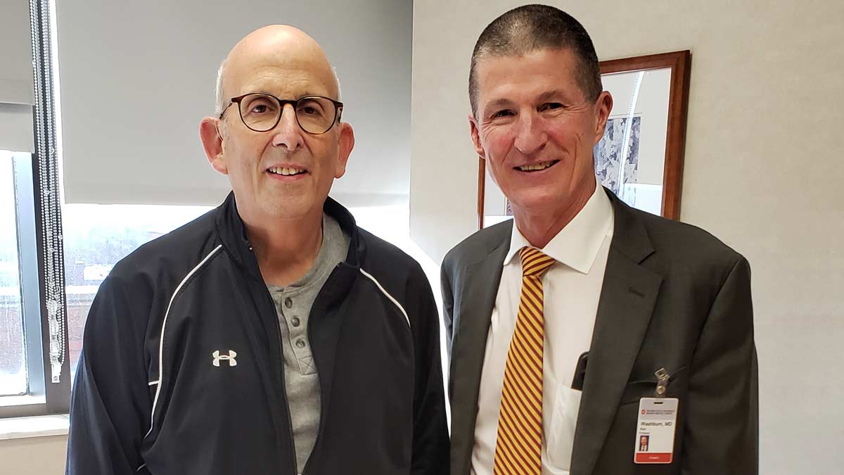 Dr. Steinburg and Dr. Washburn standing together in a clinic room