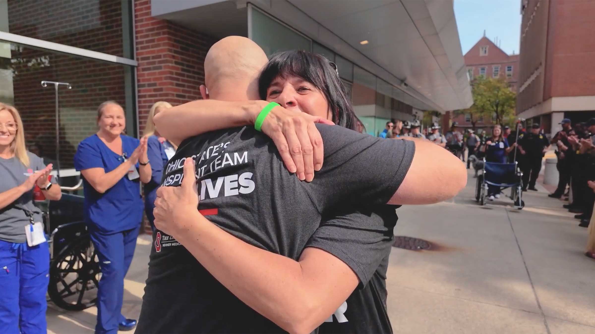 Kidney donor Tracy Harvey hugging kidney recipient Andrew Geer