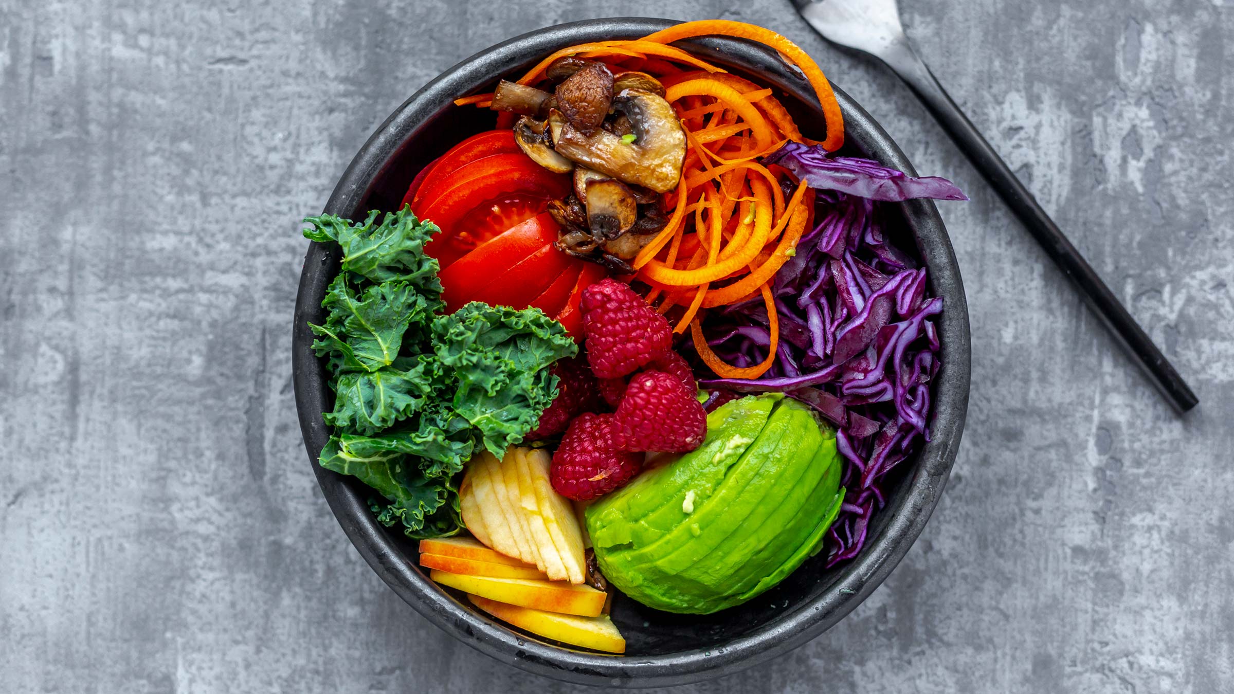 A fruit and vegetable salad in a bowl