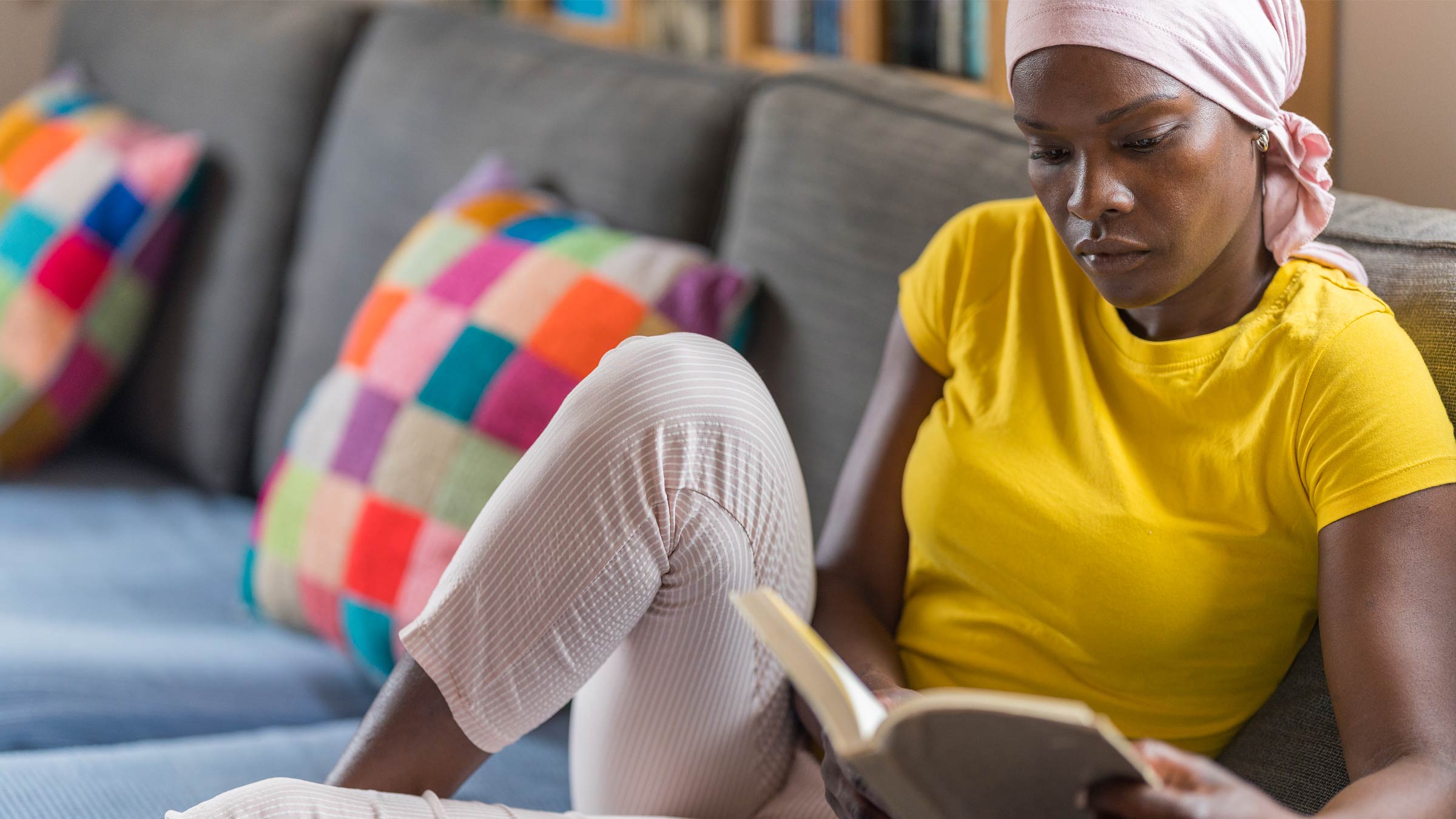 Woman reading an article about breast cancer