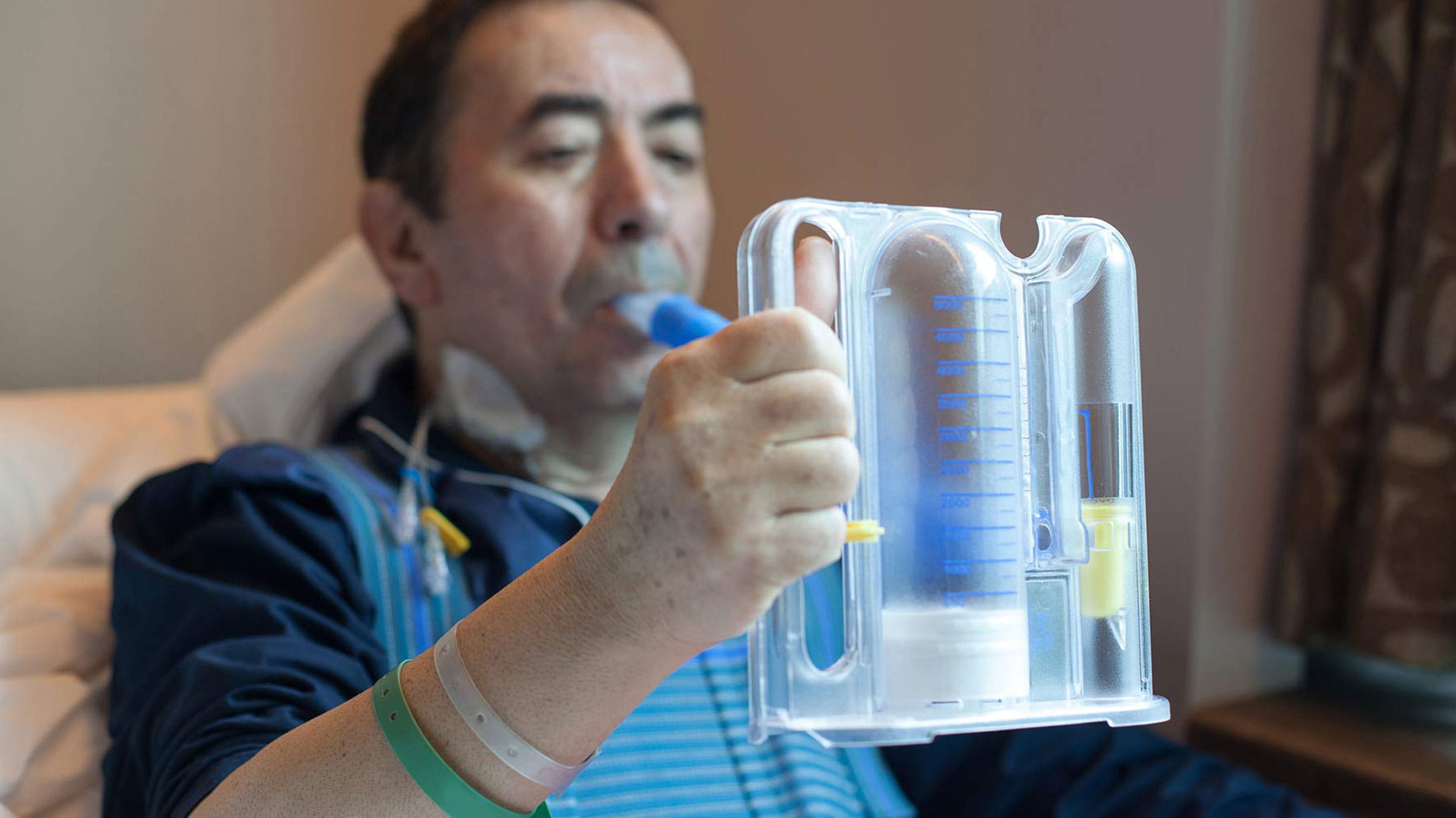 Man taking a lung function test