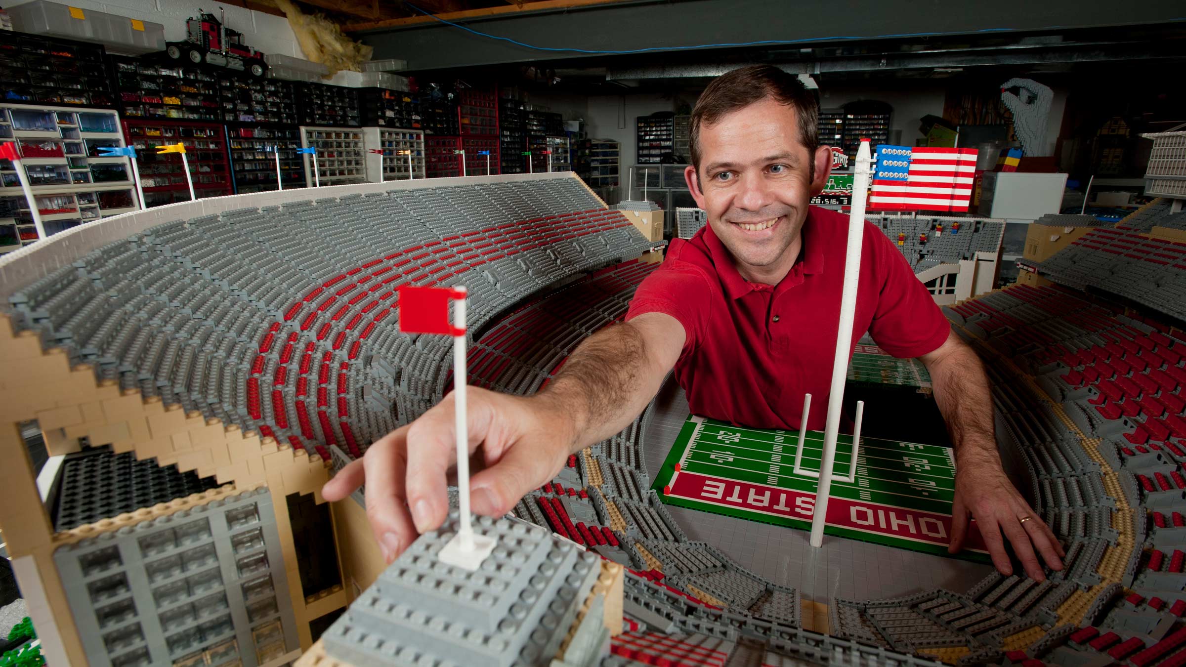 Professor Paul Janssen working on his 8-foot Lego replica of Ohio Stadium