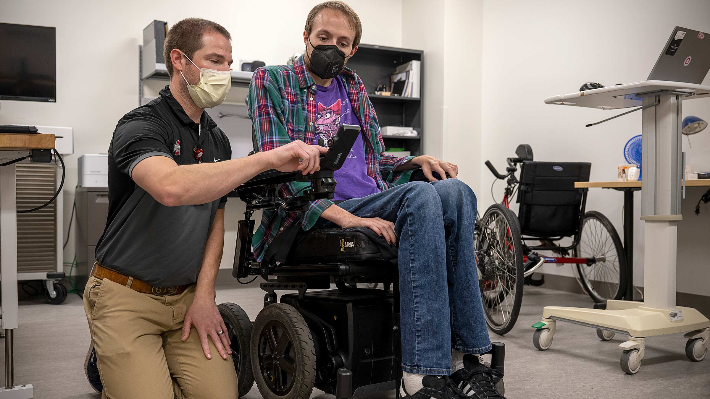 Physical therapist working with a patient at Ohio State's Assistive Technology Center
