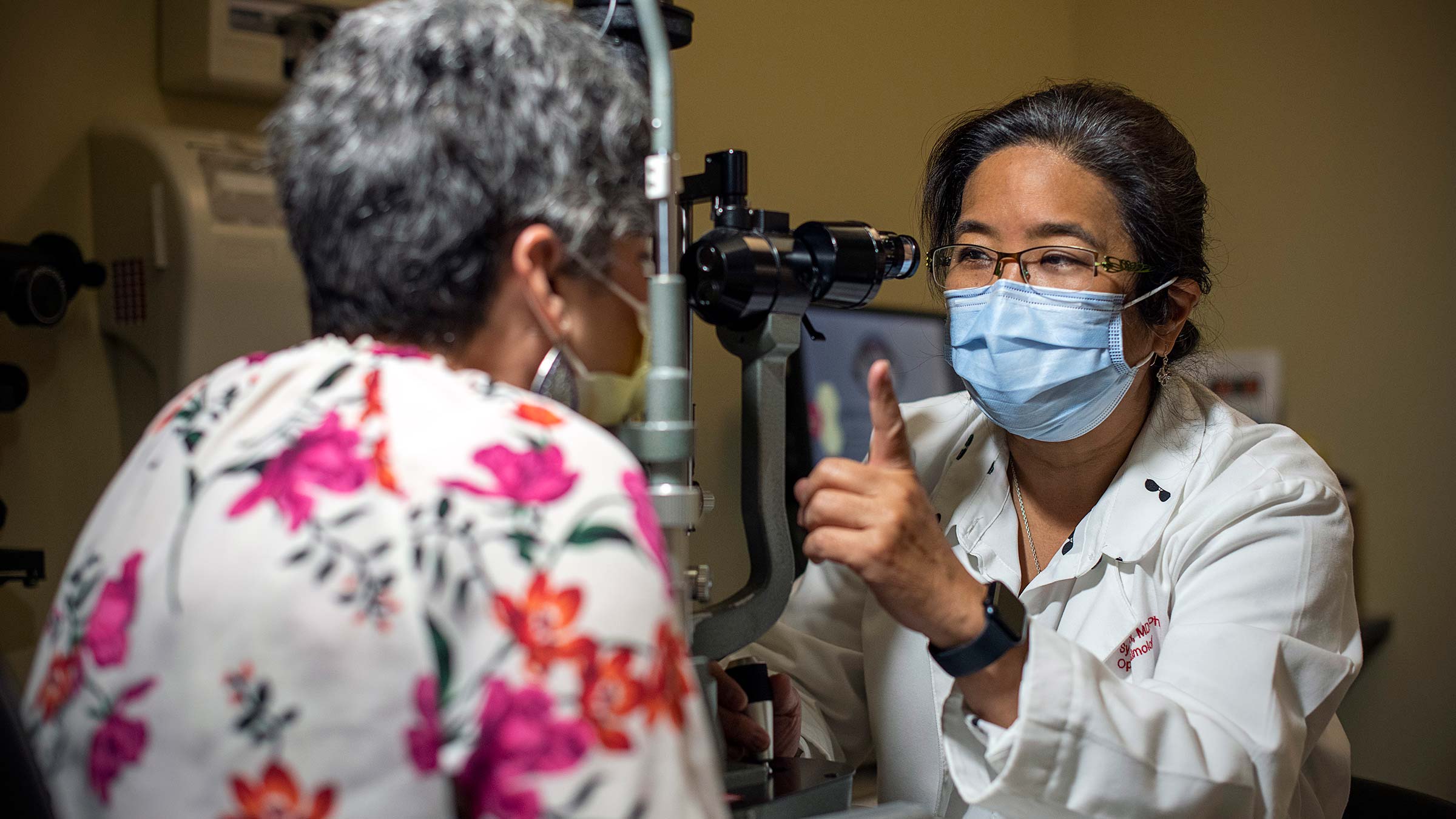 Dr. Moroi  examining a glaucoma patient