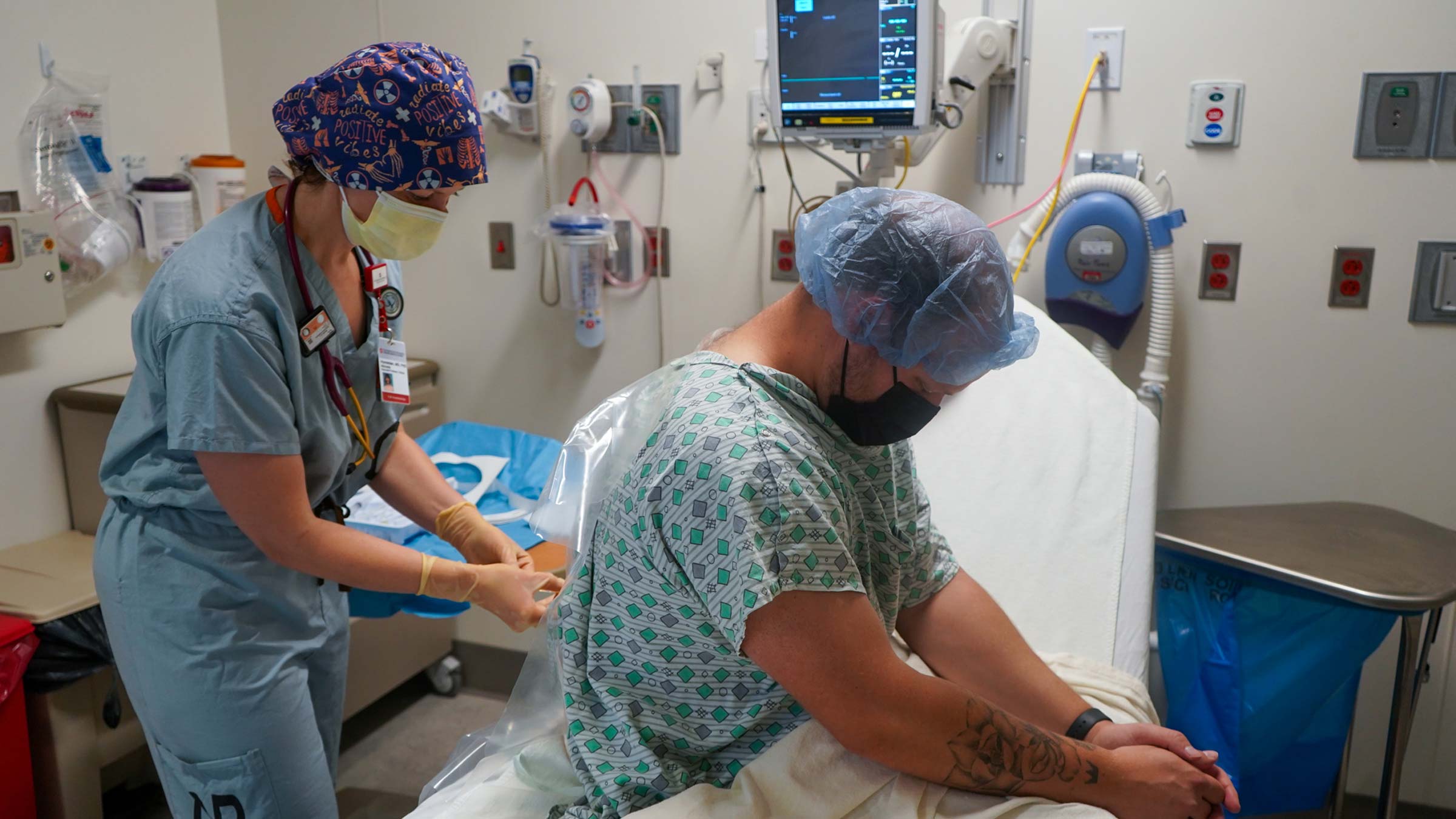 Michelle Humeidan, MD, administers localized pain medication to a patient prior to surgery