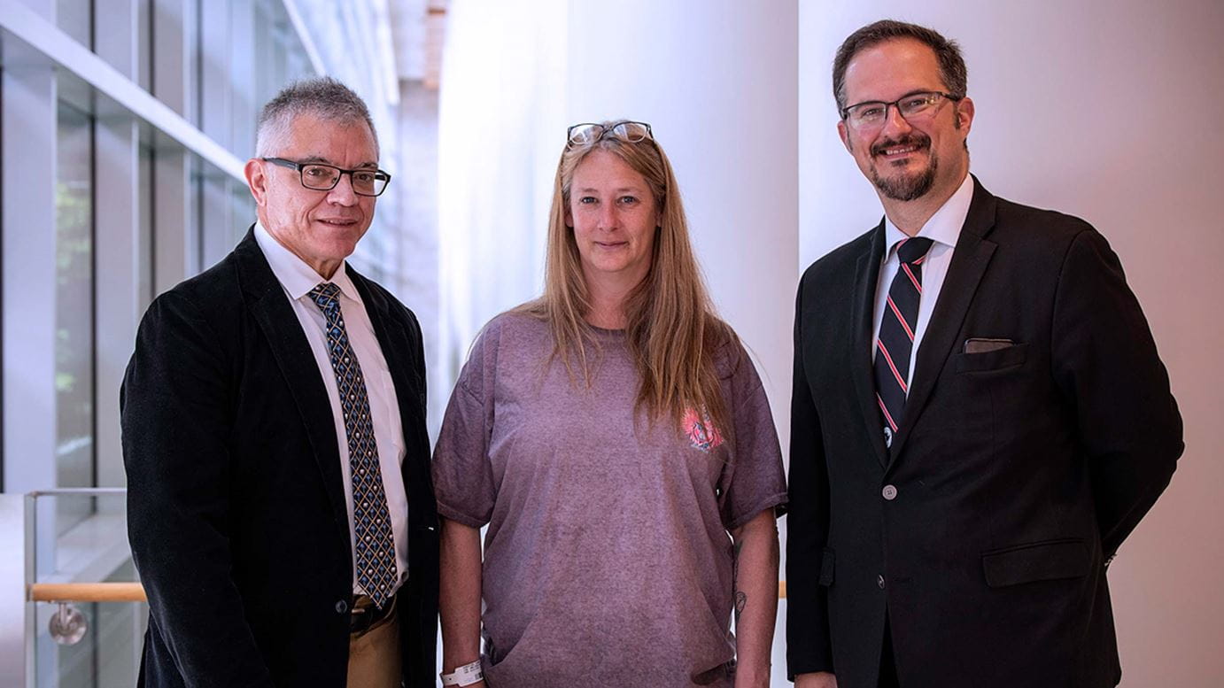 Diana Robertson meets with surgeons Daniel Prevedello, MD, a neurosurgeon, and Ricardo Carrau, MD at the OSUCCC – James