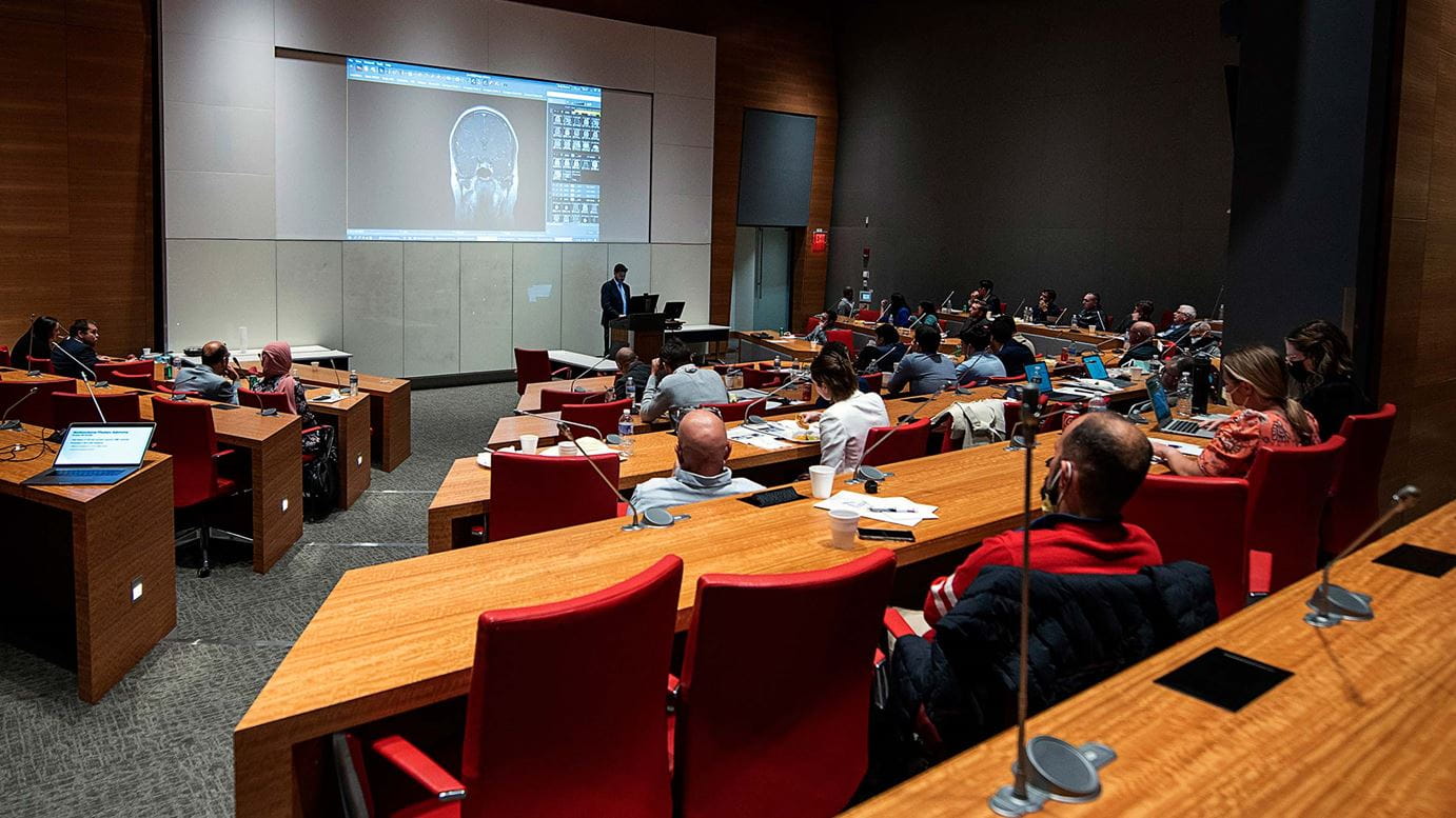 Head and neck surgeons gathered in a conference room