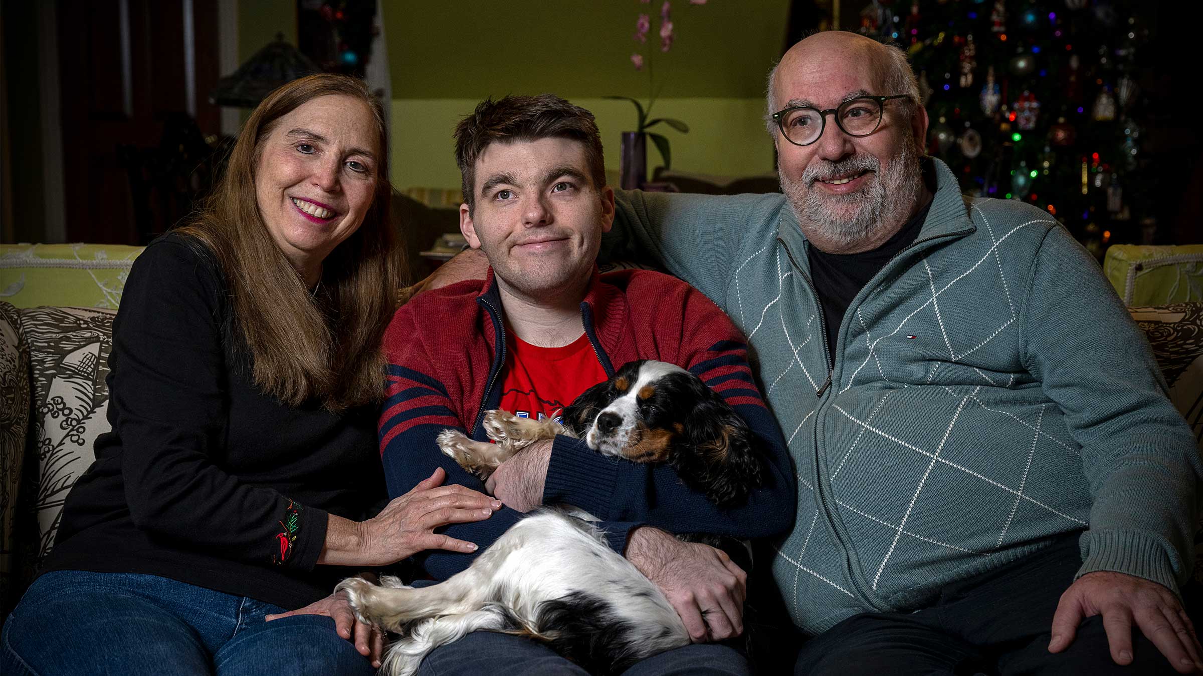 James Shannon at home with his parents and dog