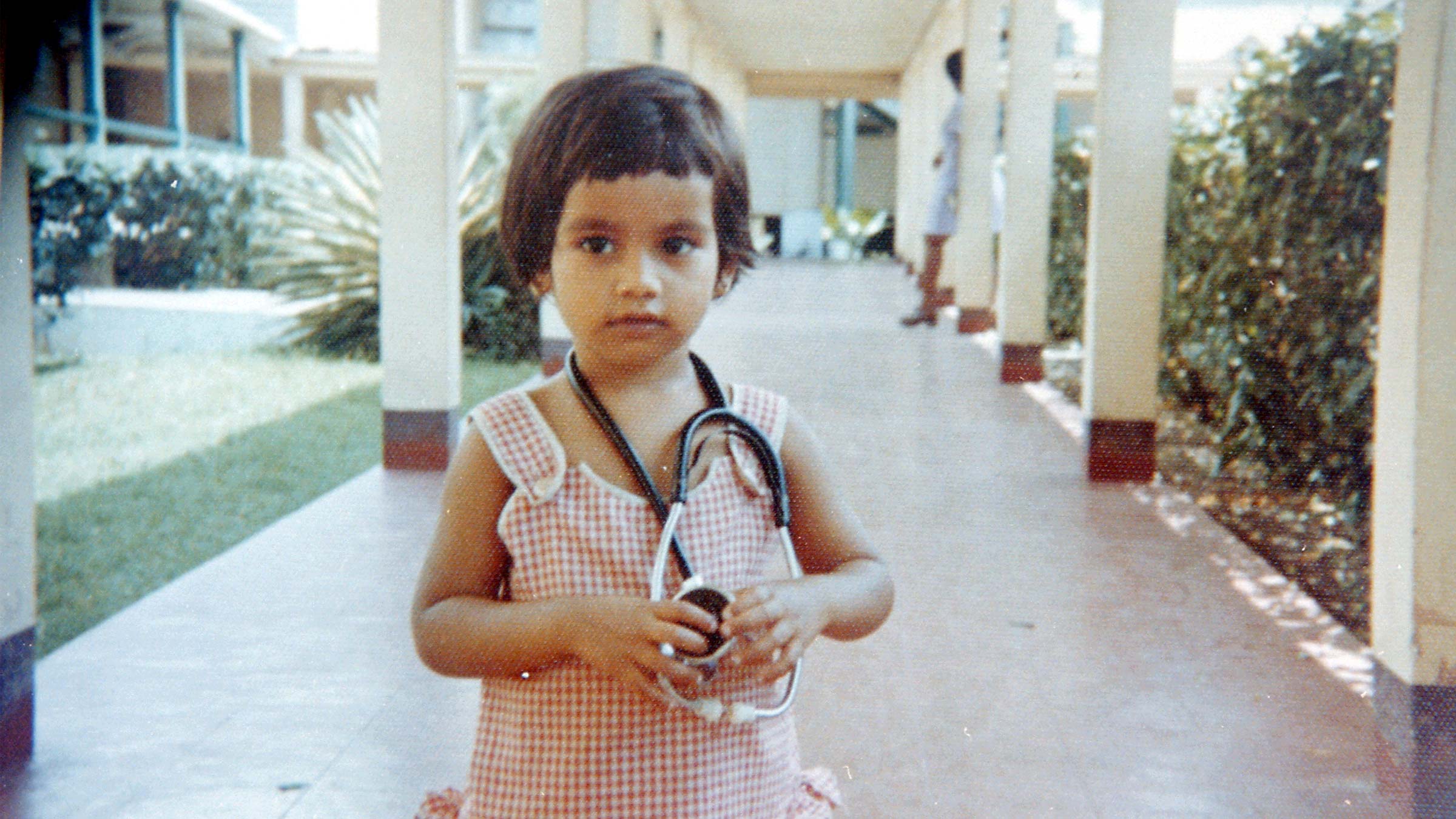 Dr. Laxmi Mehta as a young child in Buff Bay Hospital in Jamaica