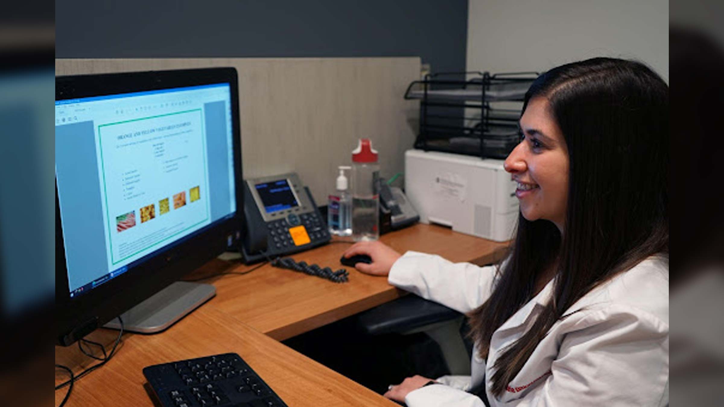 Registered dietitian Anna Maria Bittoni meets virtually with a cancer survivor to explain the benefits of different foods.