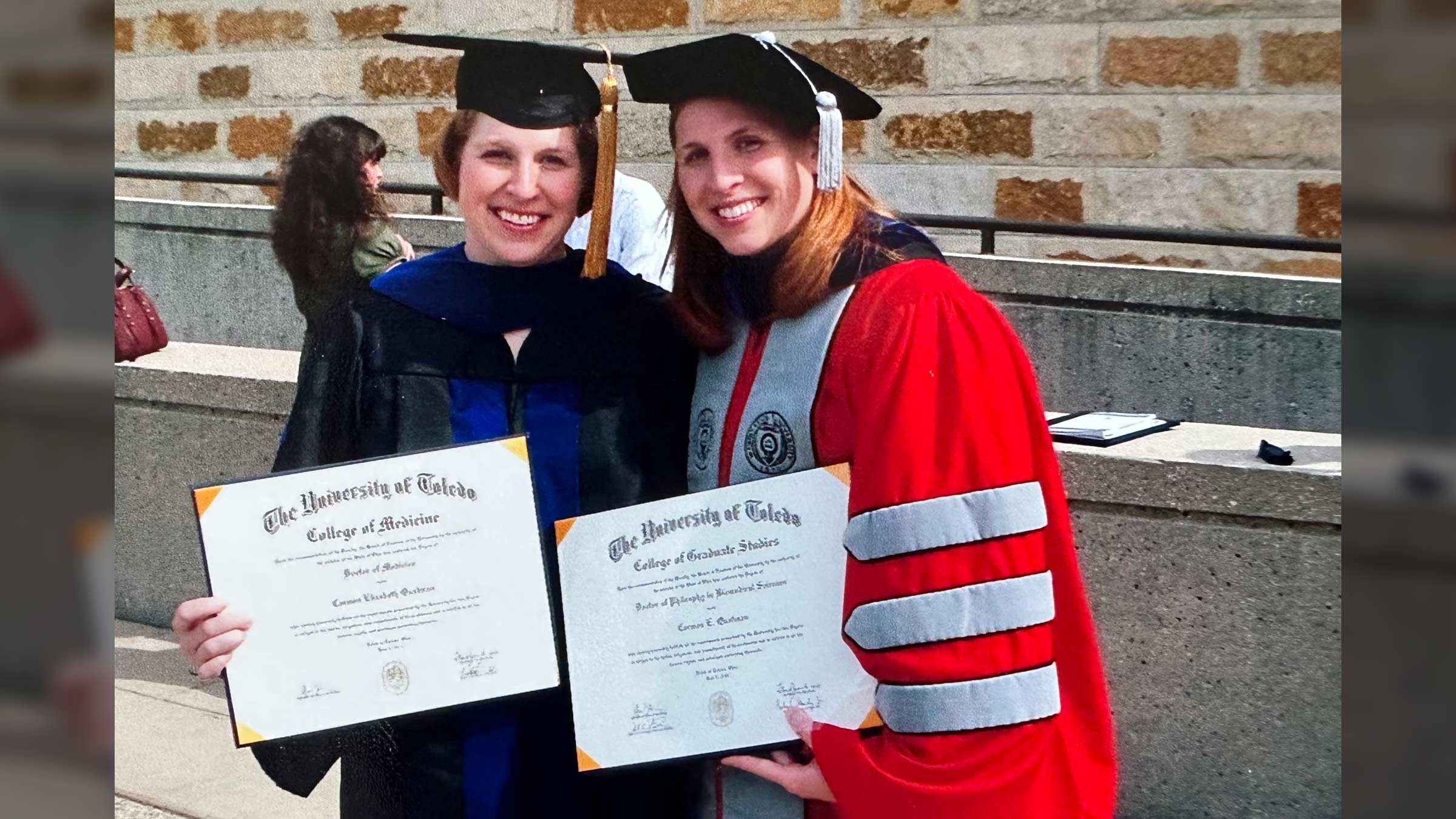 Carmen Quatman, MD, PhD, and her twin sister, Catherine “Katie” Quatman-Yates, DPT, PhD, earned doctorate degrees together at the University of Toledo.
