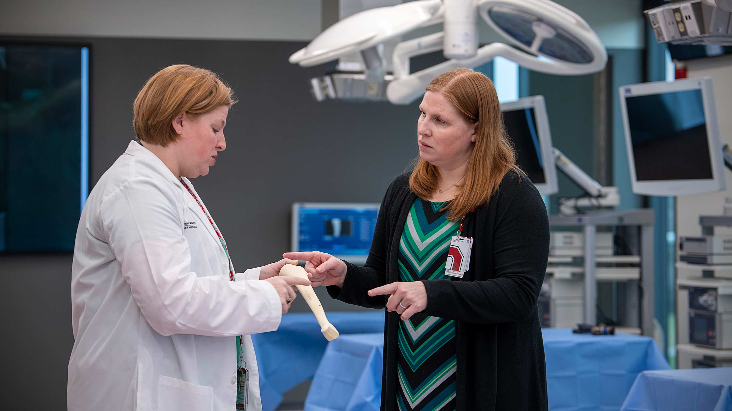 Carmen Quatman, MD, PhD, and Katie Quatman-Yates, DPT, PhD say their work overlaps frequently on the campus of the Ohio State Wexner Medical Center.
