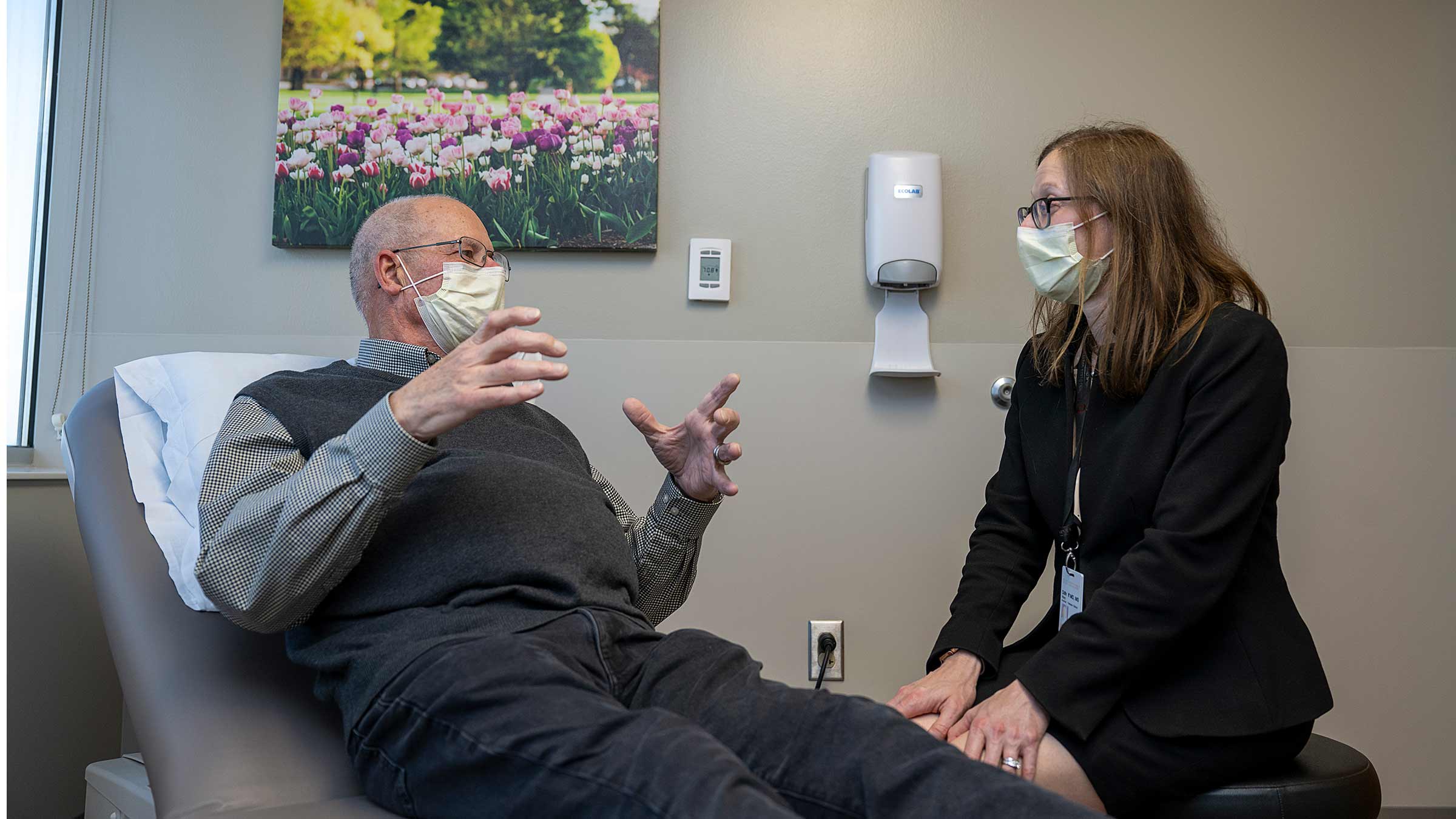 Dr. Dillhoff talking to a patient