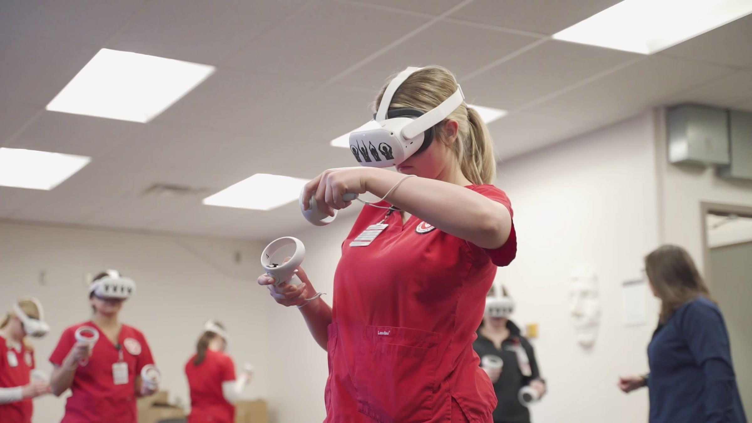 Nursing student wearing VR set